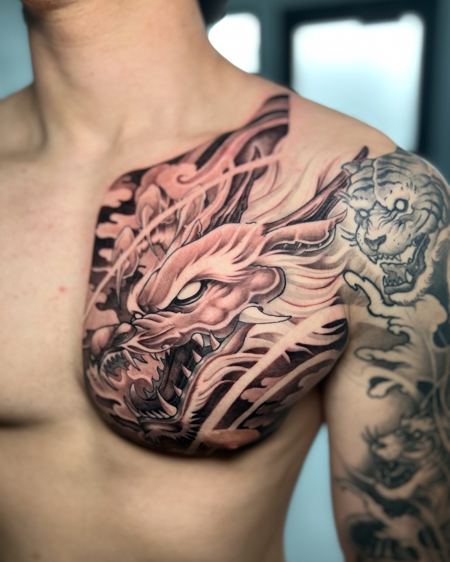 Dragon japanese irezumi tattoo on the chest by Johnson