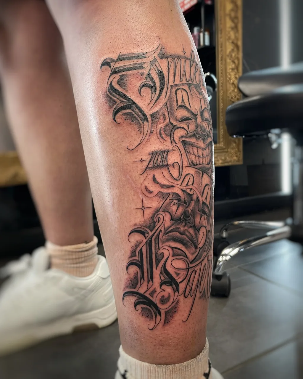 Skull and script lettering script tattoo on the calf by Blot_Tattoo