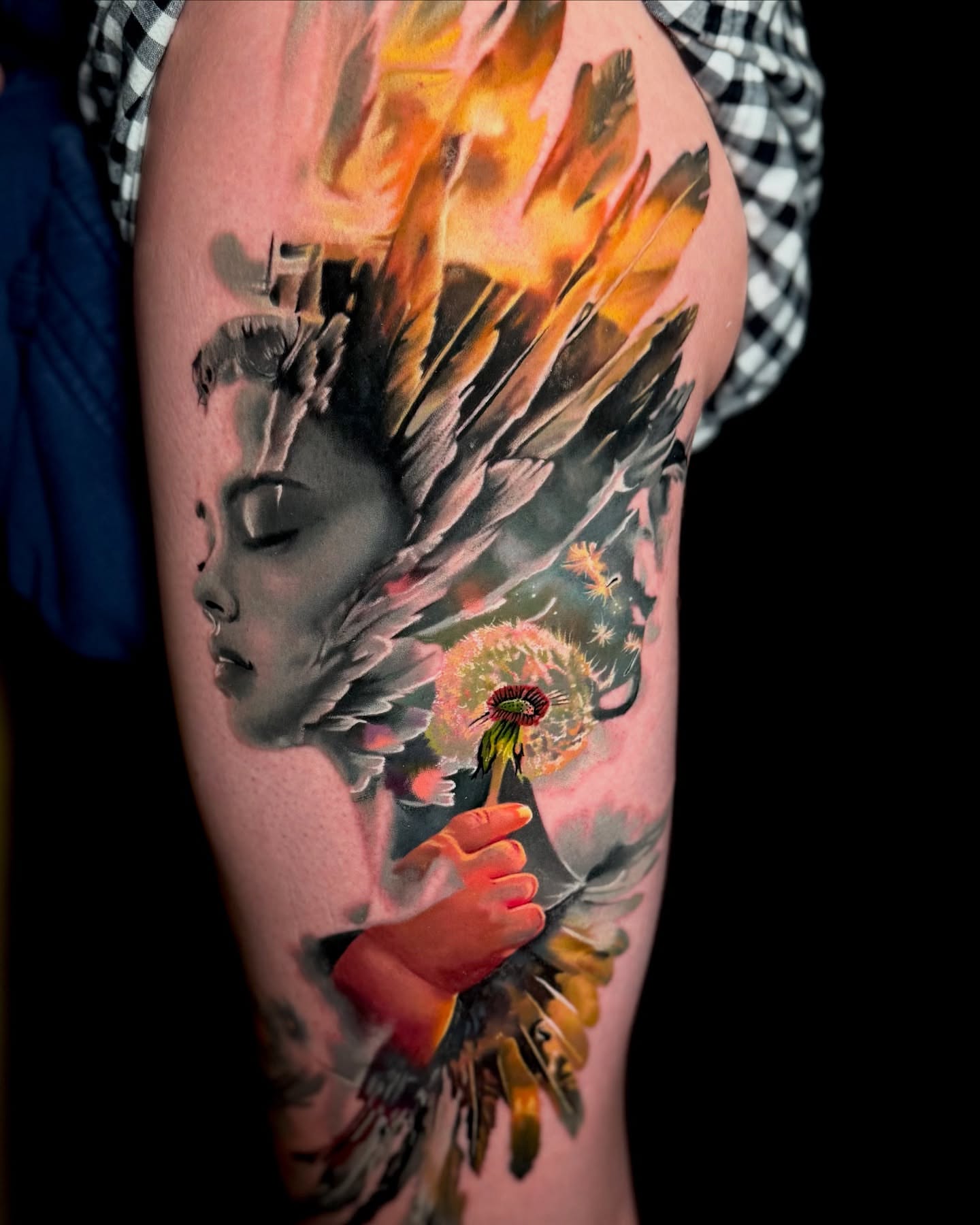 Woman with dandelion and feathers neo-traditional tattoo on the forearm by Justin Shelpman