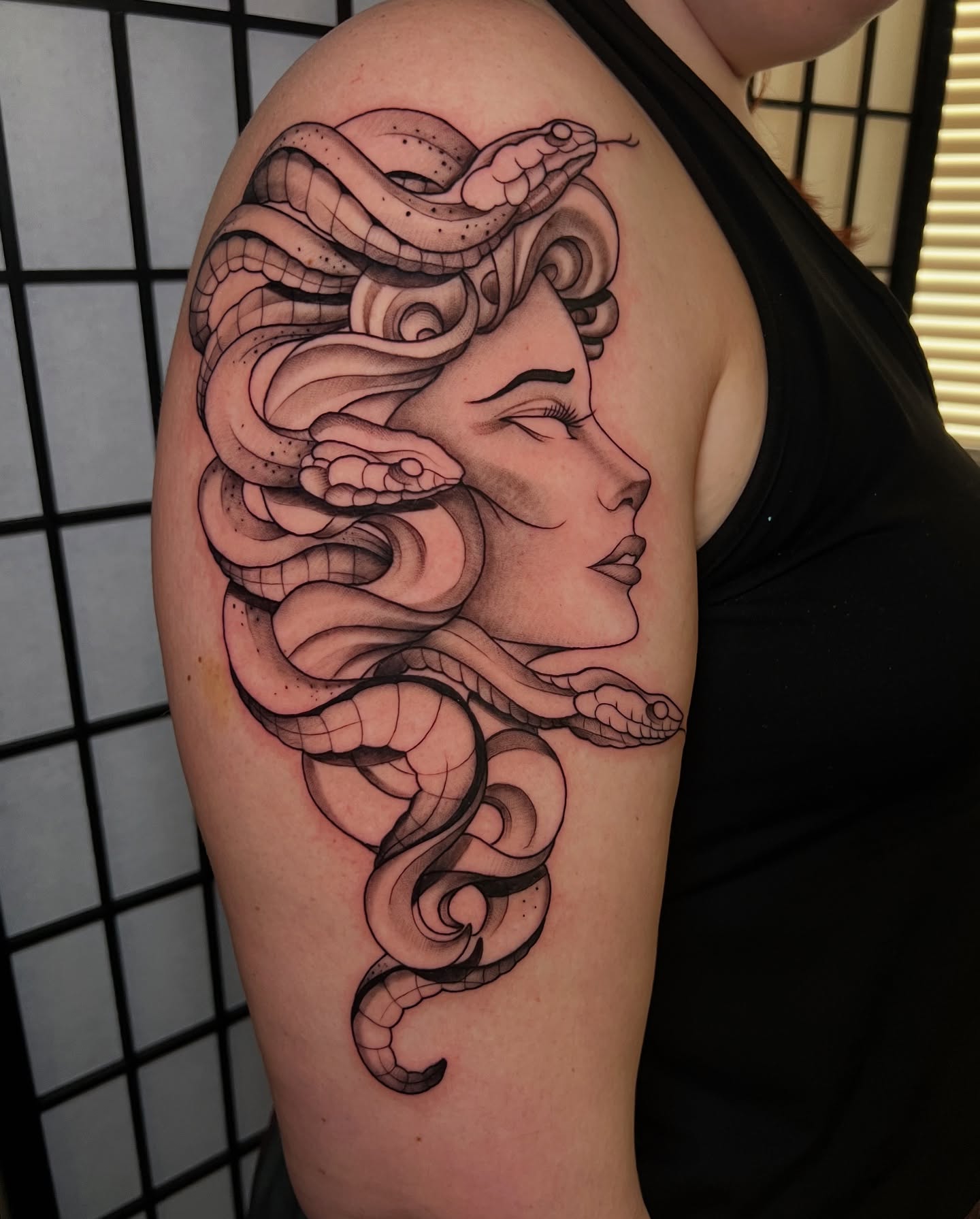 Medusa realism tattoo on the shoulder by Baung Ben