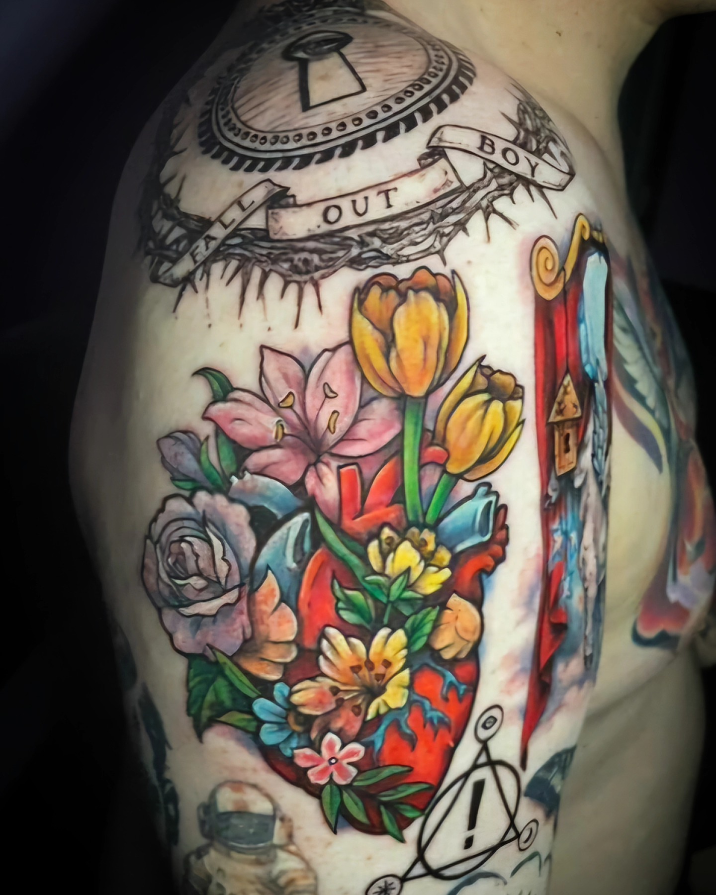 Floral bouquet American traditional tattoo on the shoulder by Jennalea