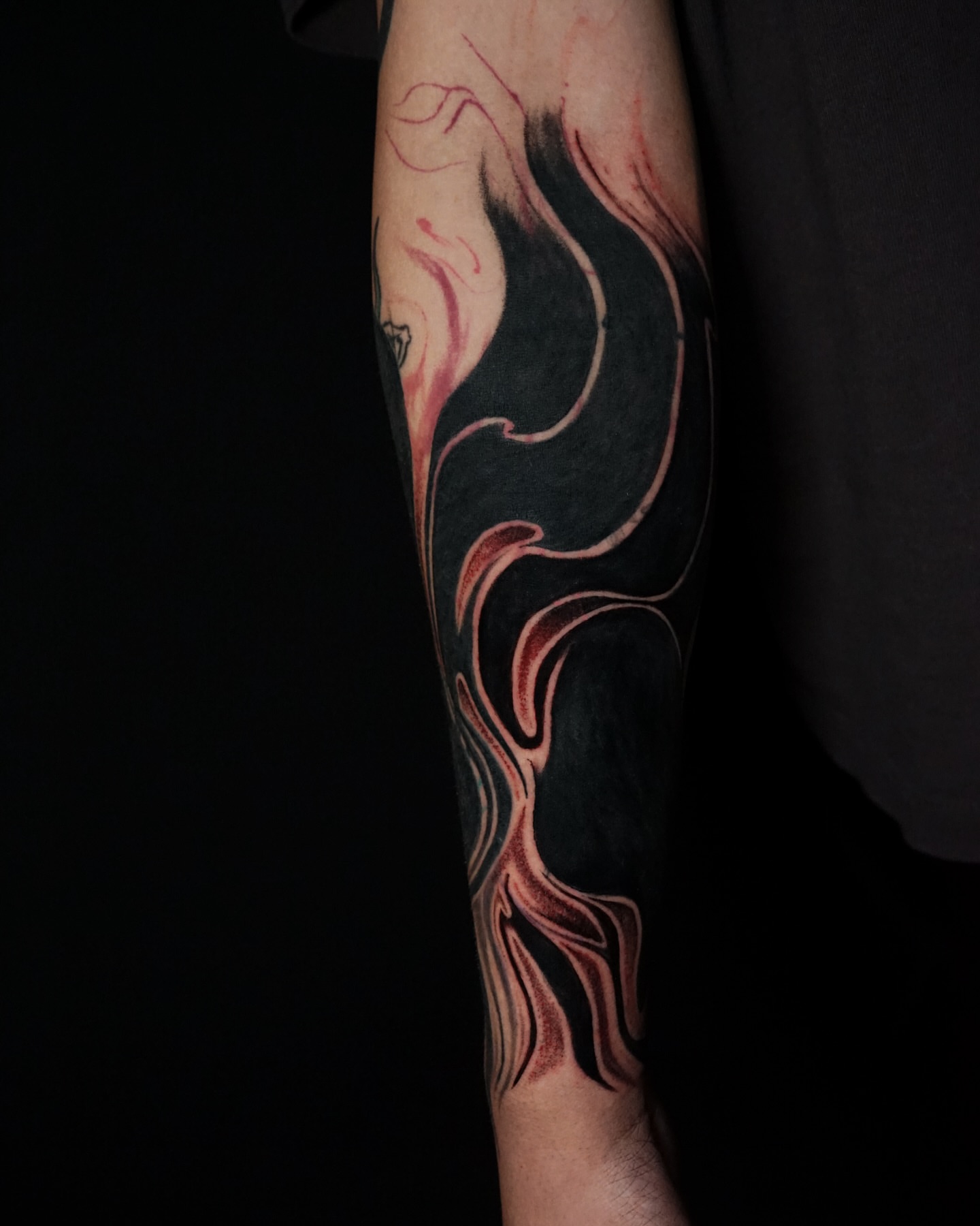 Flames black and grey tattoo on the forearm by Anh Nguyen