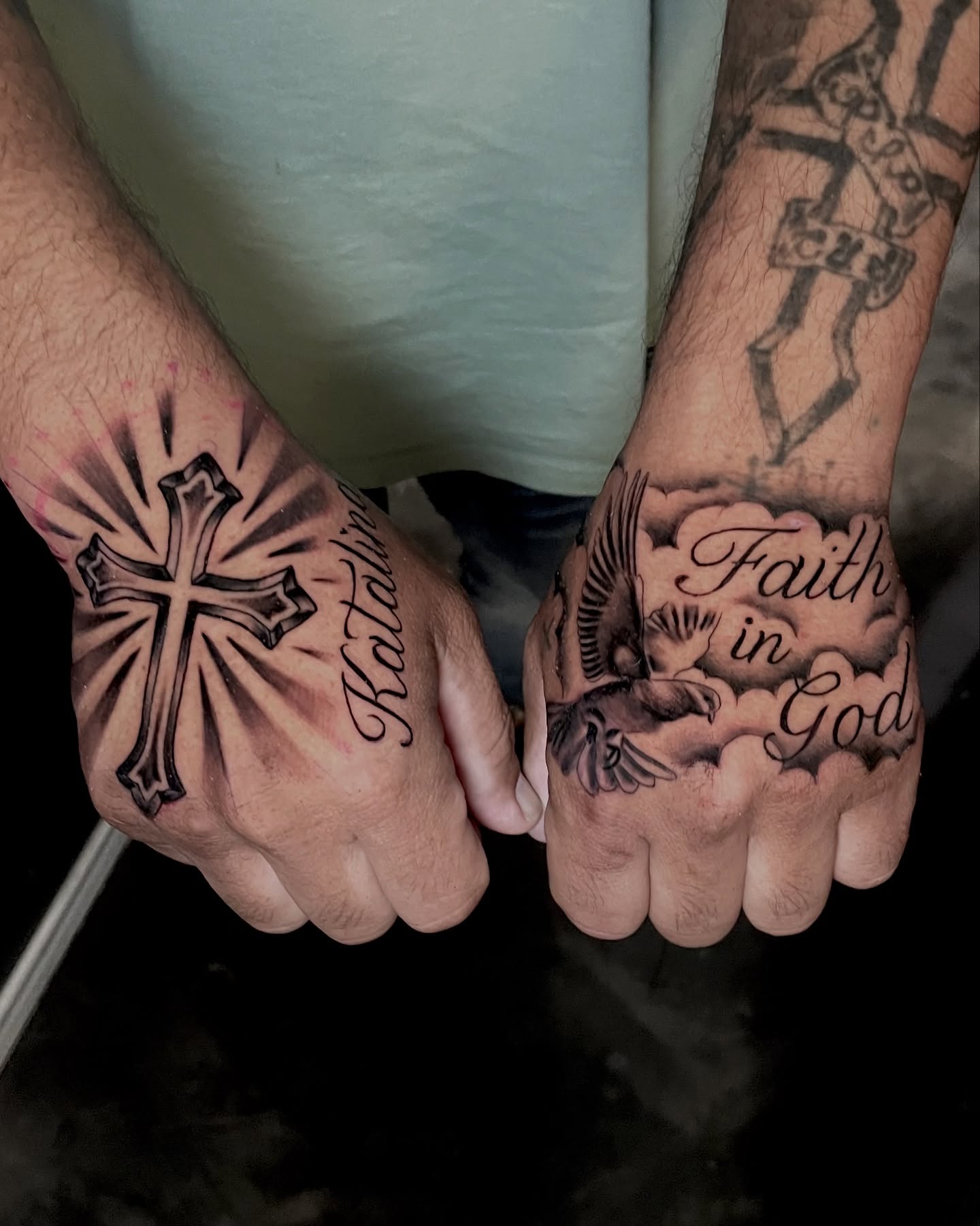 Cross and eagle black and grey tattoo on the hand by Chubbs