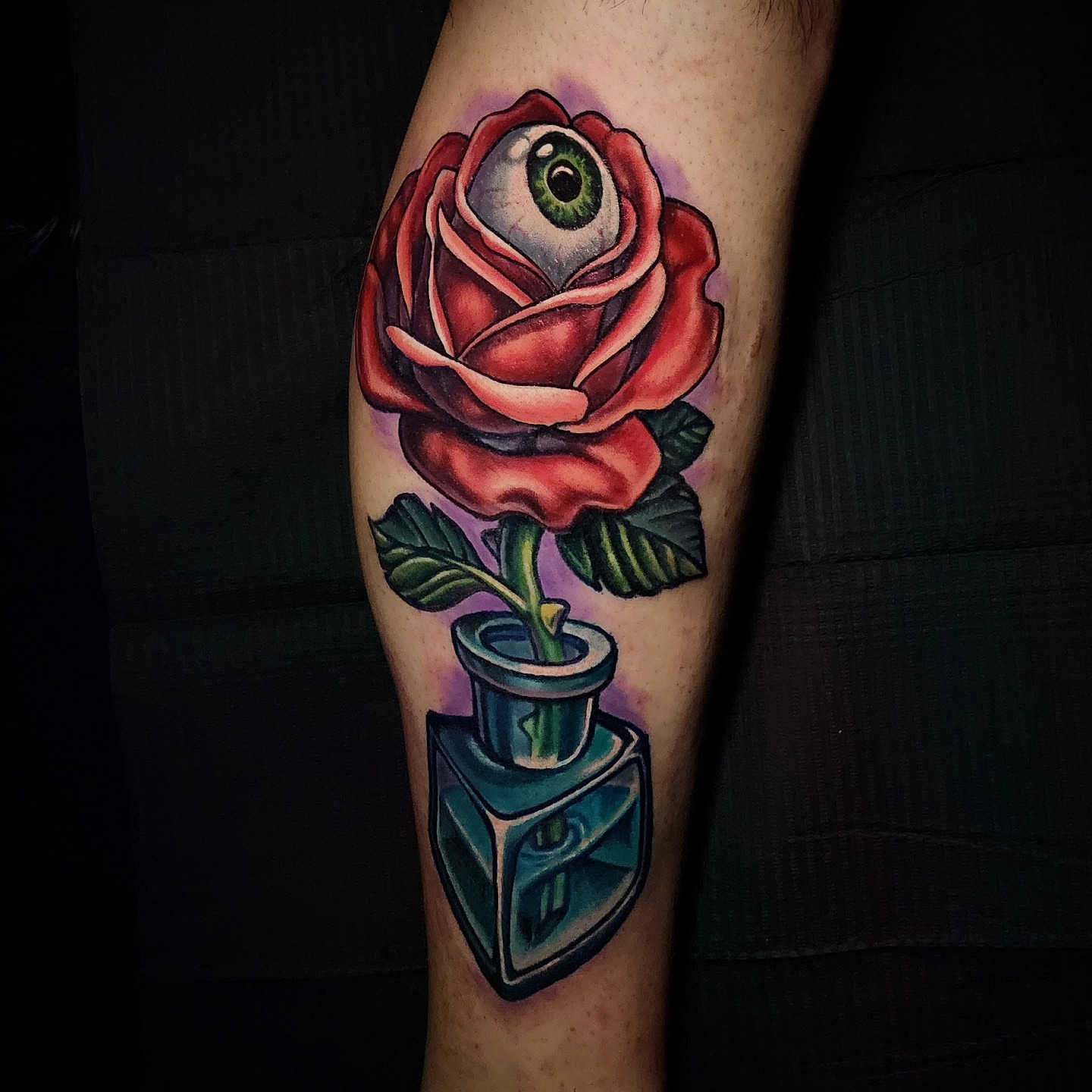 Rose with eyeball American traditional tattoo on the forearm by Chicago Tattoo Artist New School Tattoos, Naperville, Illinois