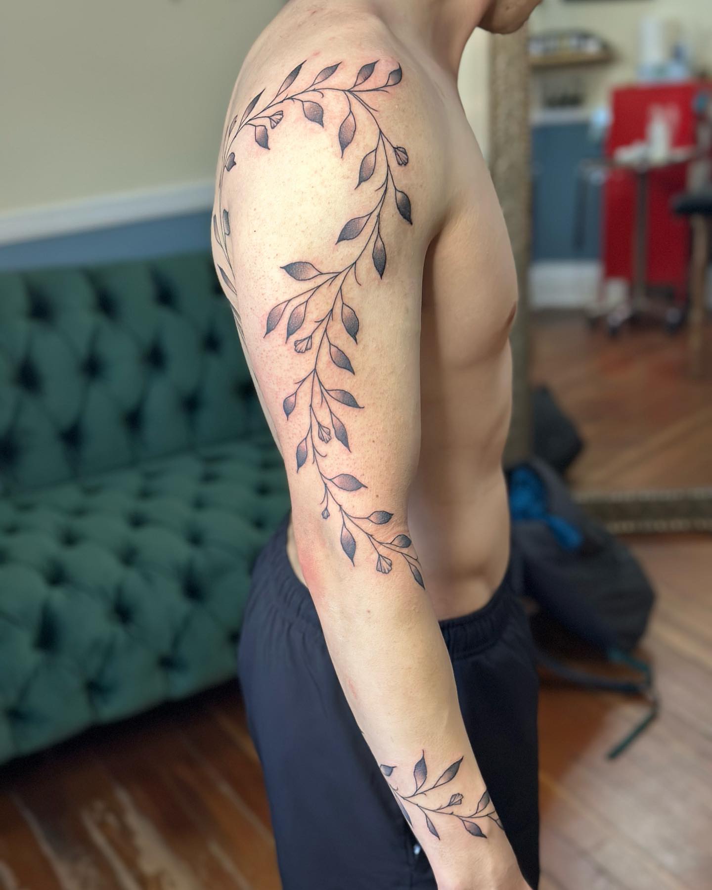 Leaf vine black and grey tattoo on the upper arm by SAL, Mesa, Arizona