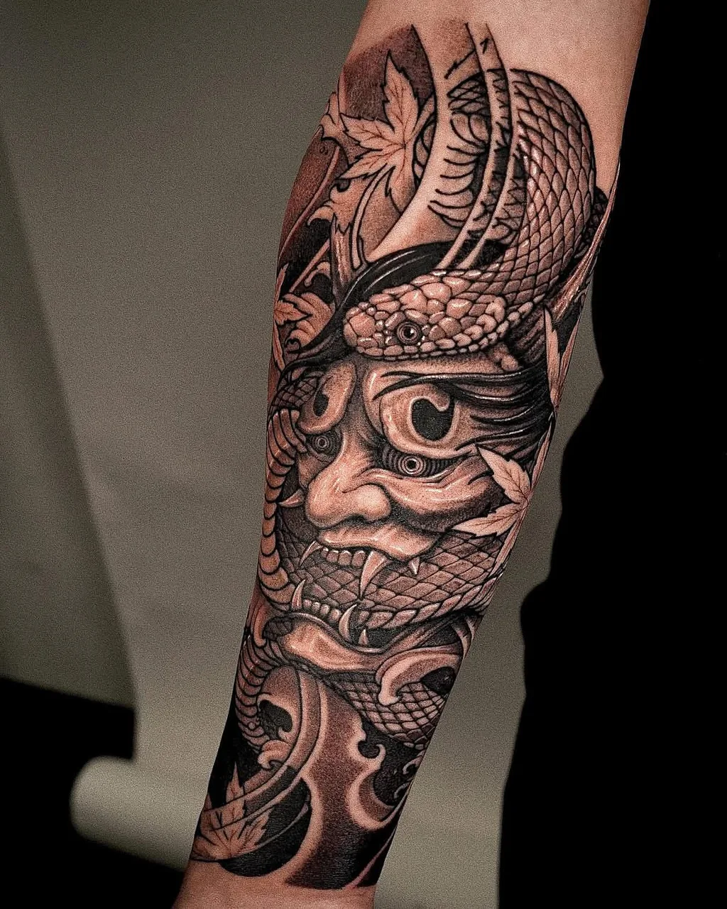 Mask with snake japanese irezumi tattoo on the forearm by Minho