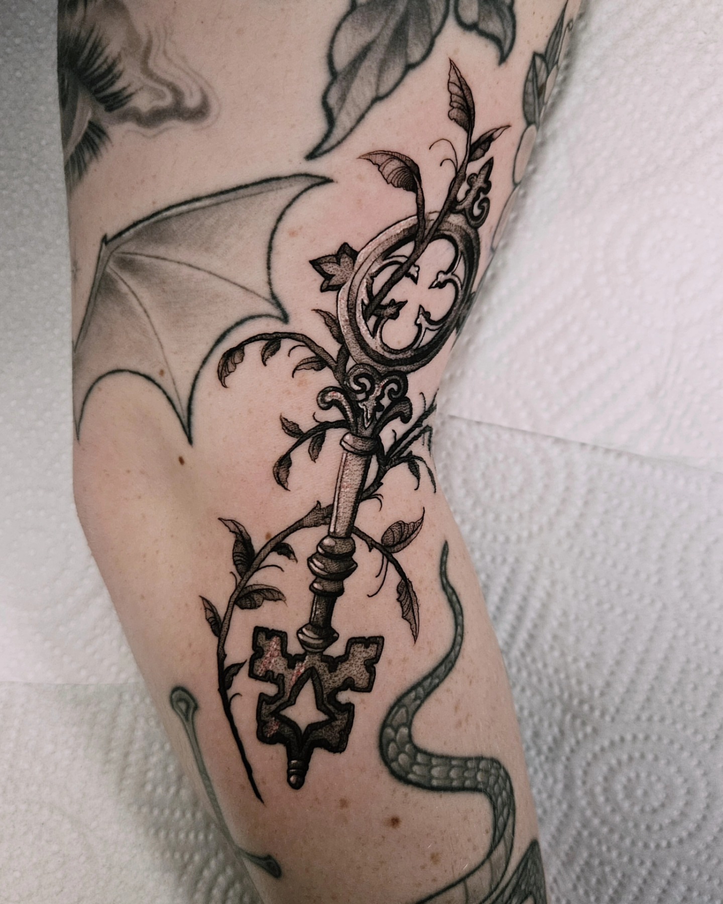 Tattoo by @fermented_ink — black_and_grey, ornamental