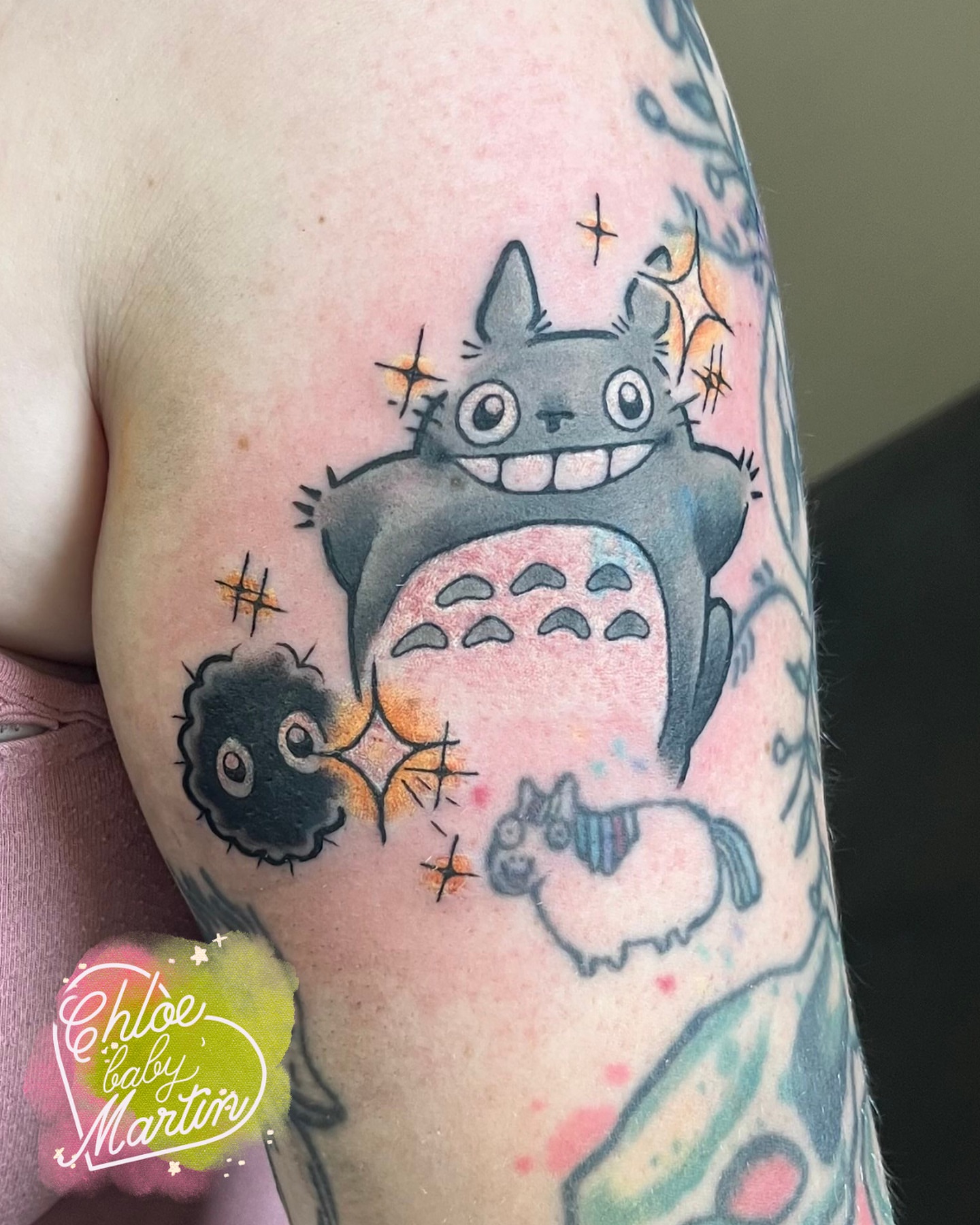 Totoro and friends dotwork tattoo on the upper arm by Chloe ‘baby’ Martin