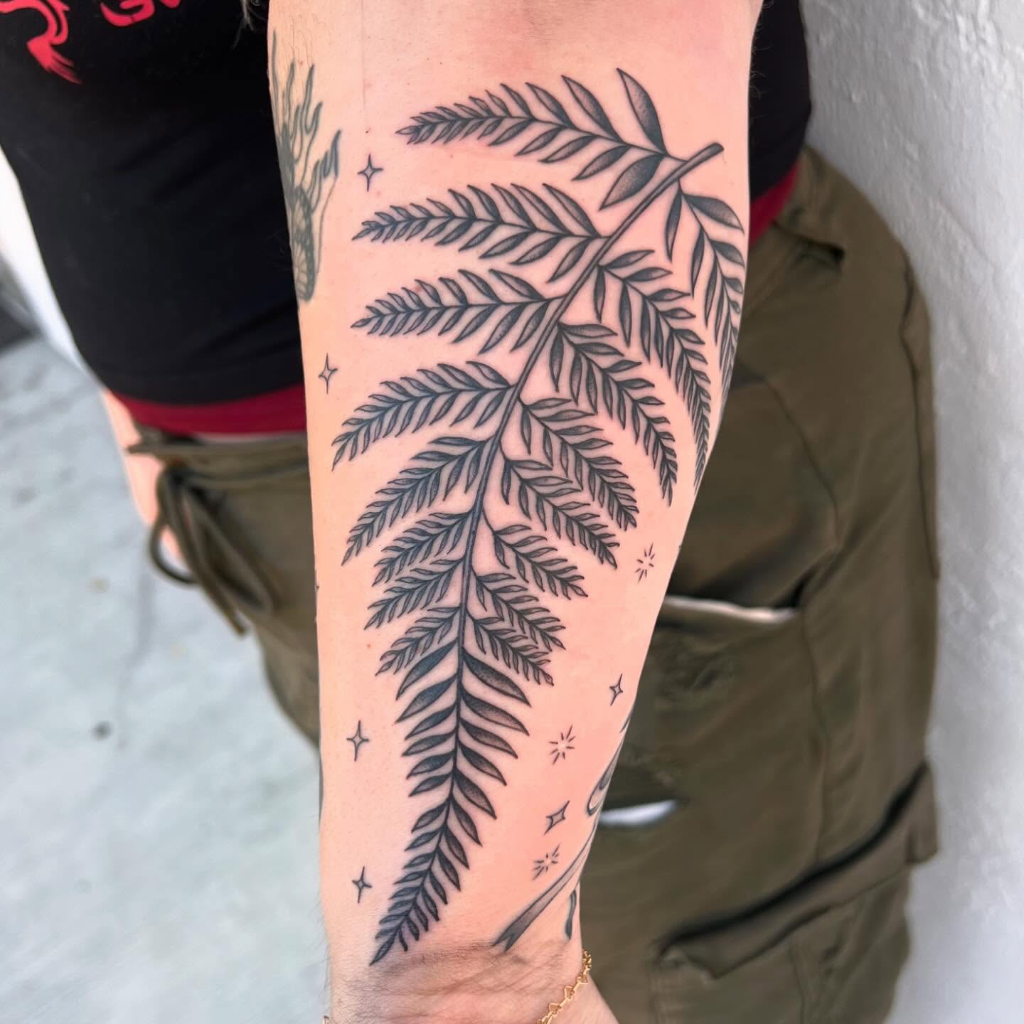Fern branch black and grey tattoo on the forearm by ♛Mollie Evans