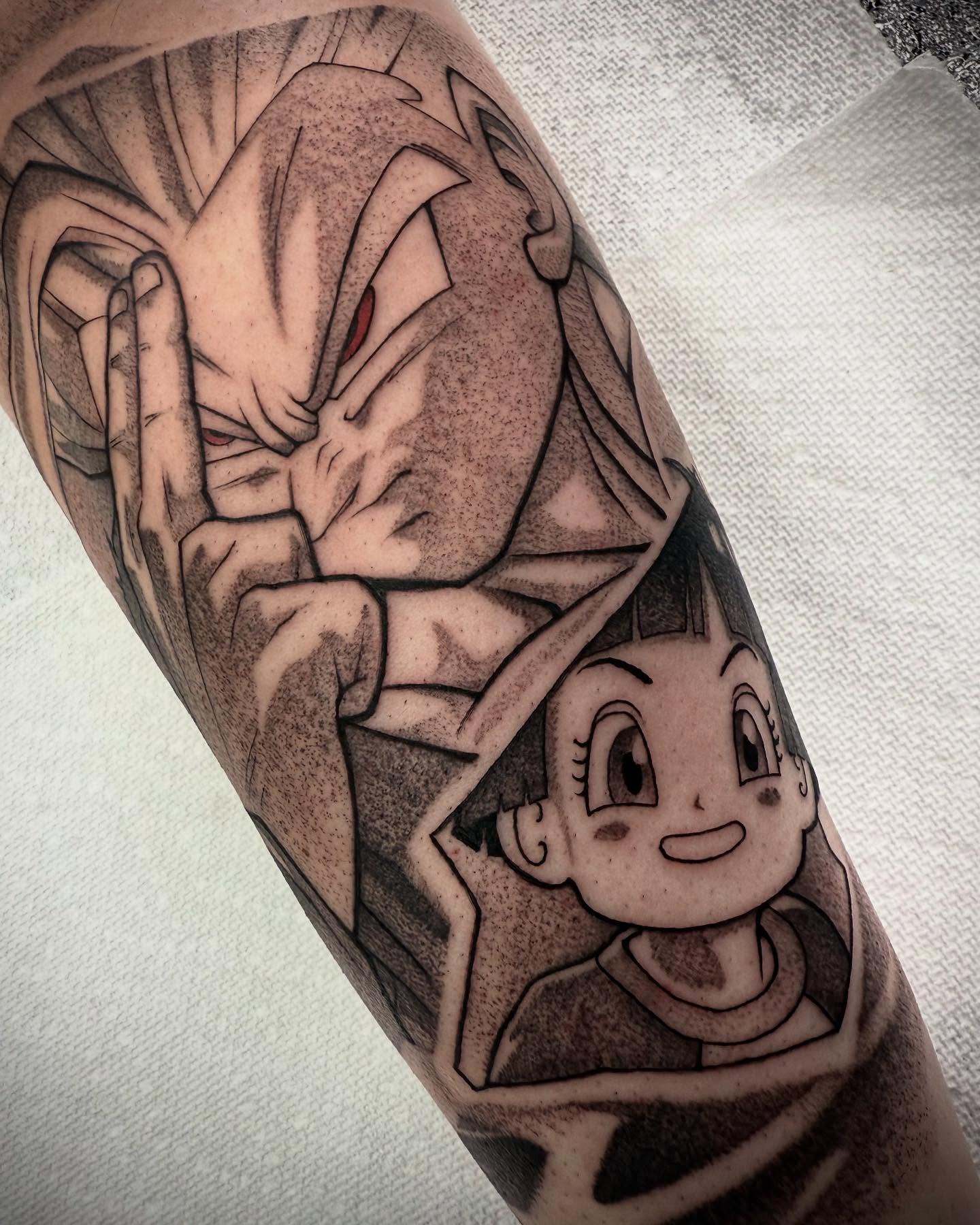 Tattoo by @tatdaddyangel — dotwork, anime