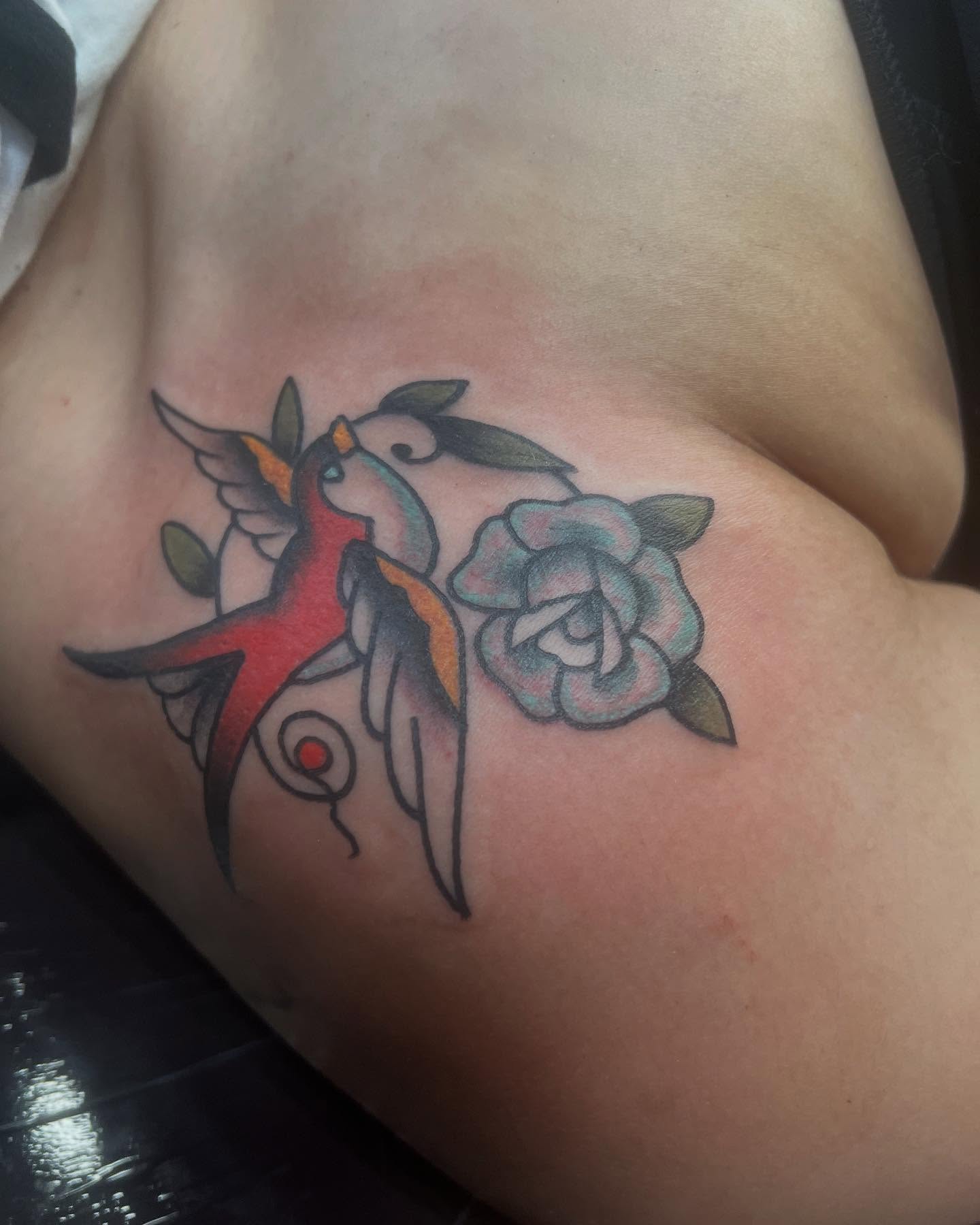 Bird and rose American traditional tattoo by Mika Clairissa