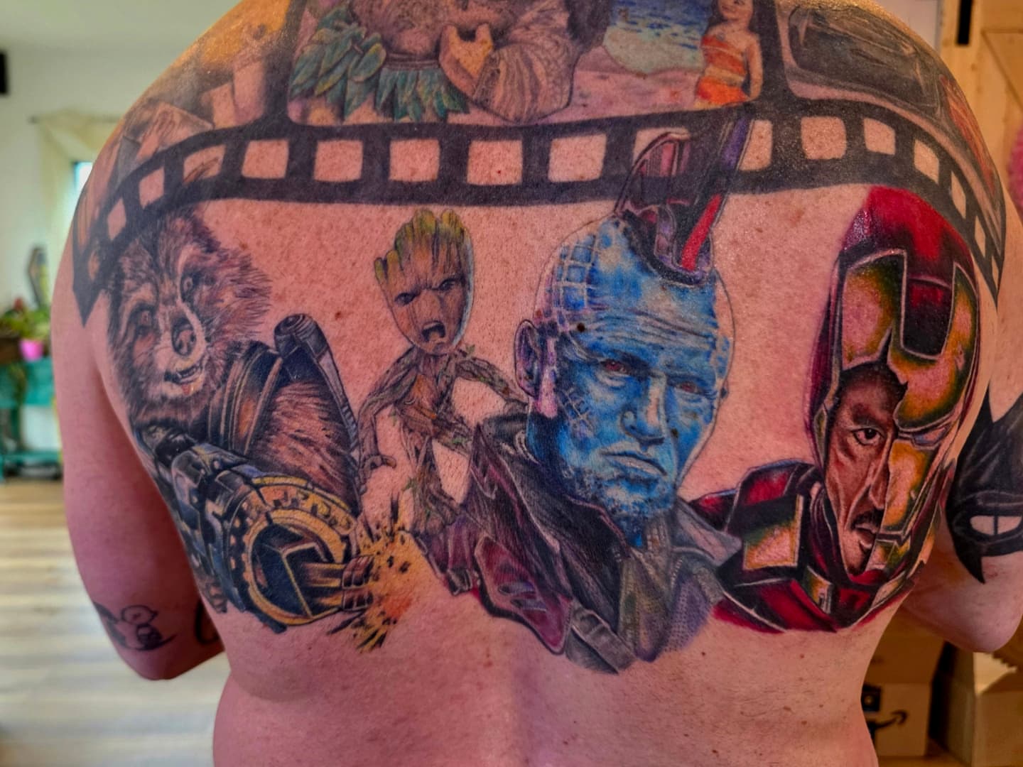 Guardians of the Galaxy characters realism tattoo on the back by Sai Machain