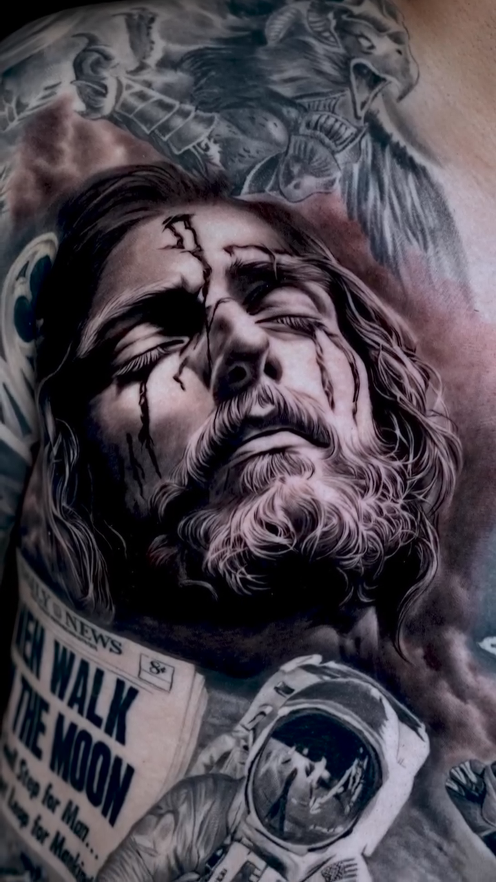 Jesus Christ and space exploration realism tattoo by Lynn Hoang, Honolulu, Hawaii