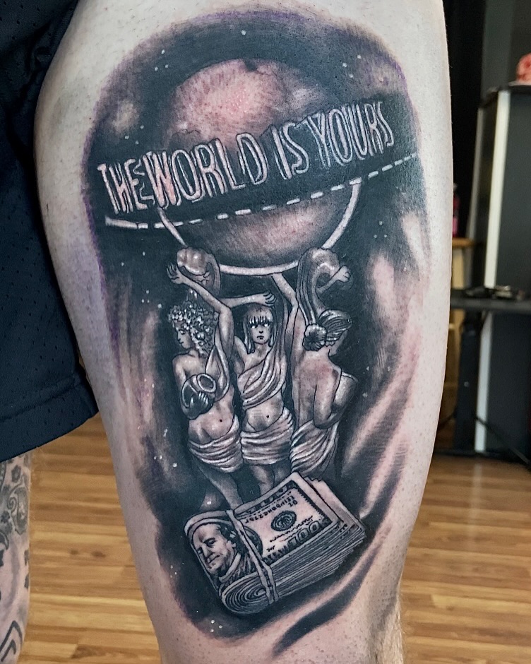 The world is yours realism tattoo on the thigh by Colt