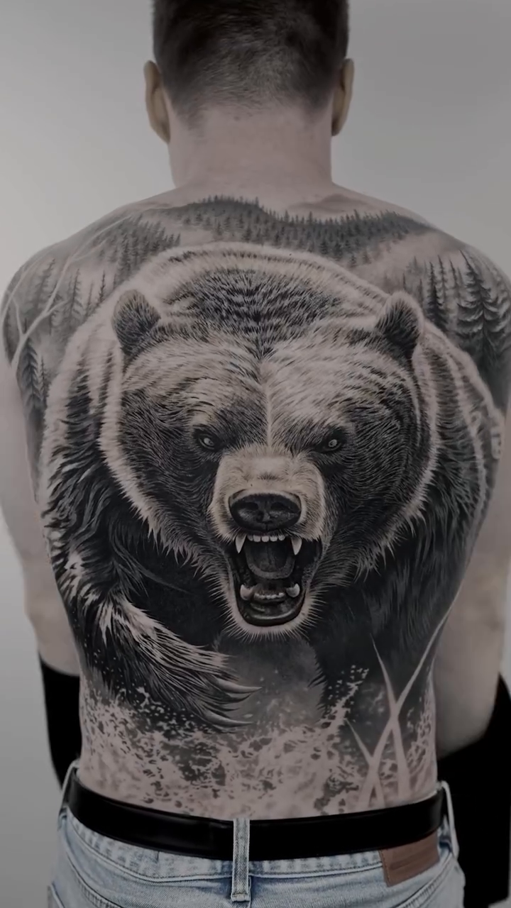 Bear with landscape realism tattoo by Jesus Alonso