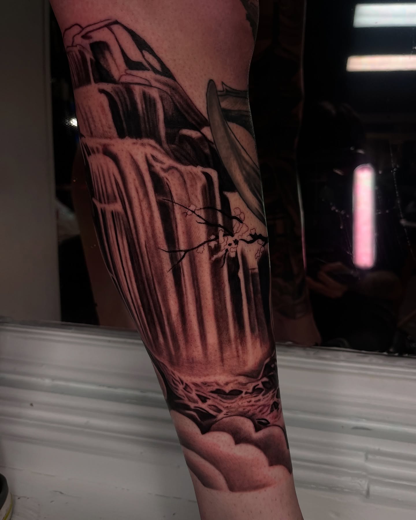 Waterfall realism tattoo on the forearm by Angie Morales, Laredo, Texas