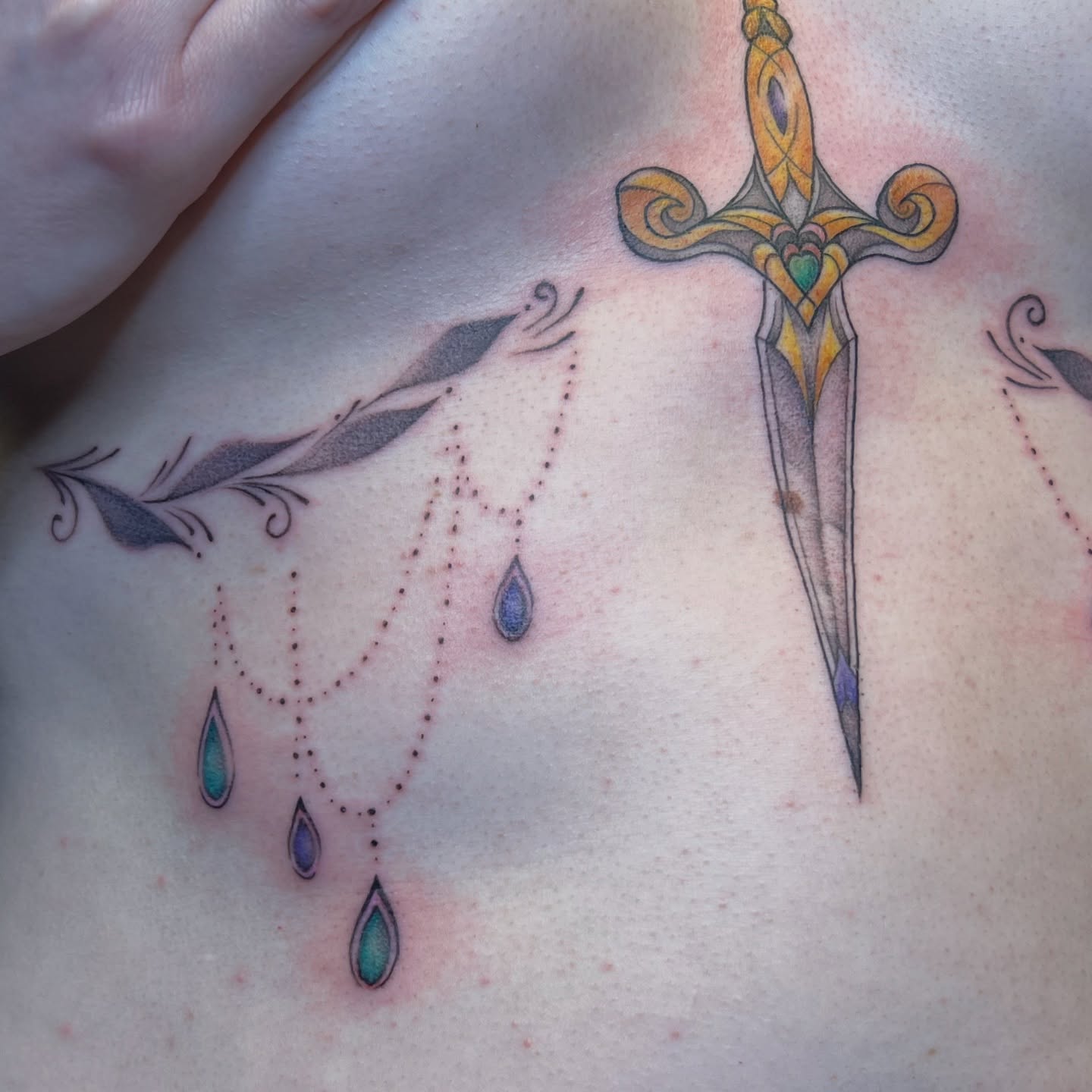 Sword and tears dotwork tattoo on the chest by Dani McBay