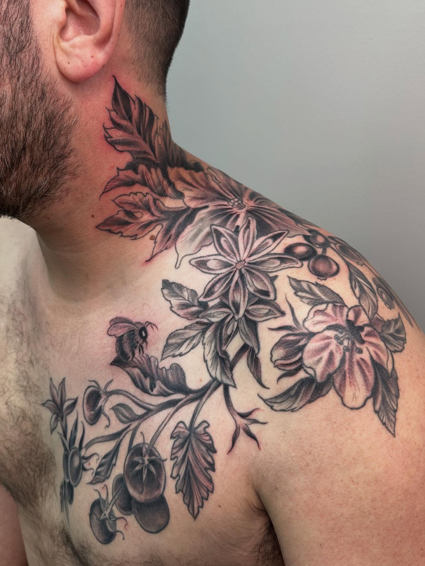 Floral arrangement realism tattoo on the shoulder by Heather Tattoos Danvers MA