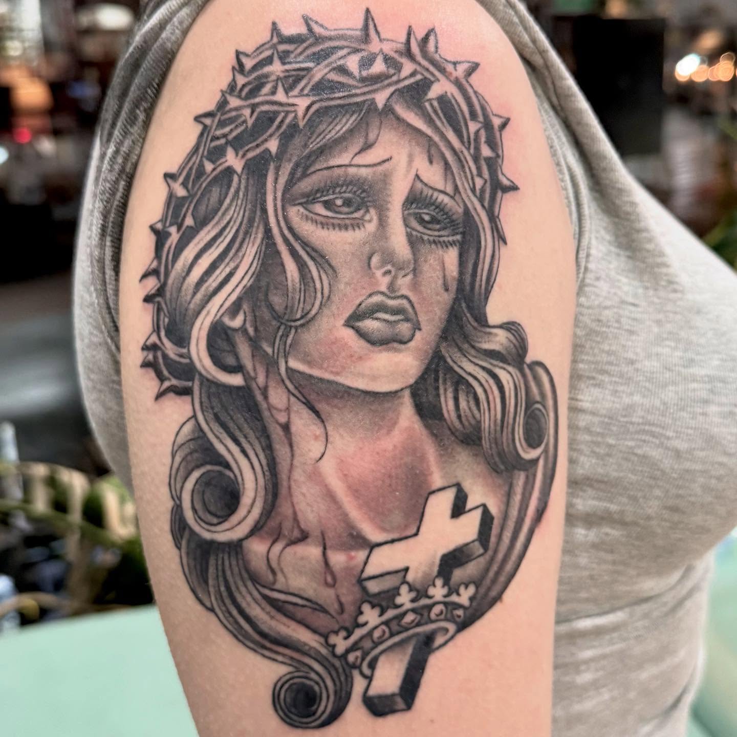 Woman with crown of thorns realism tattoo on the forearm by 𝕯𝖗𝖆𝕶𝖊㋛