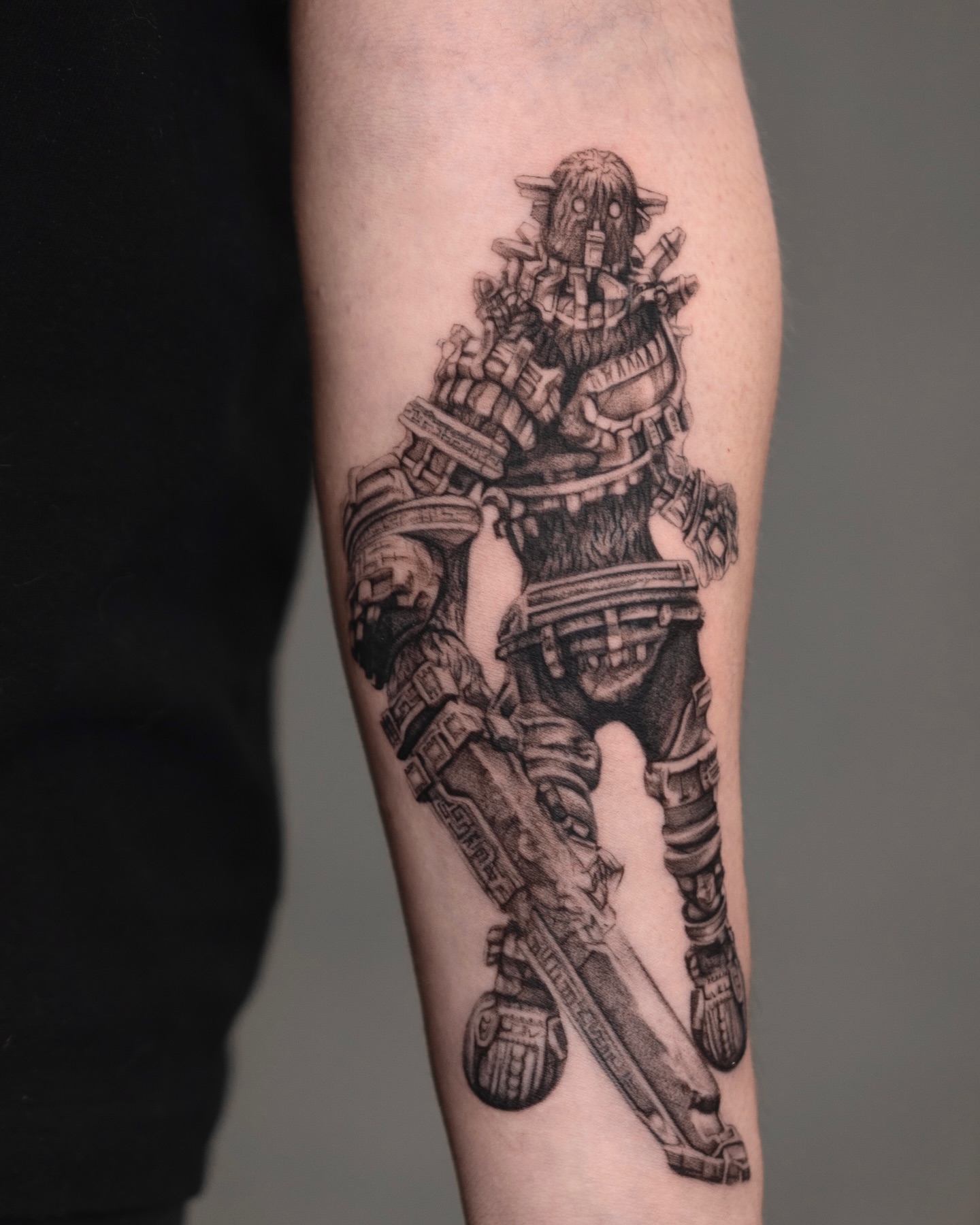 Mecha warrior black and grey tattoo on the forearm by Valery Cardona