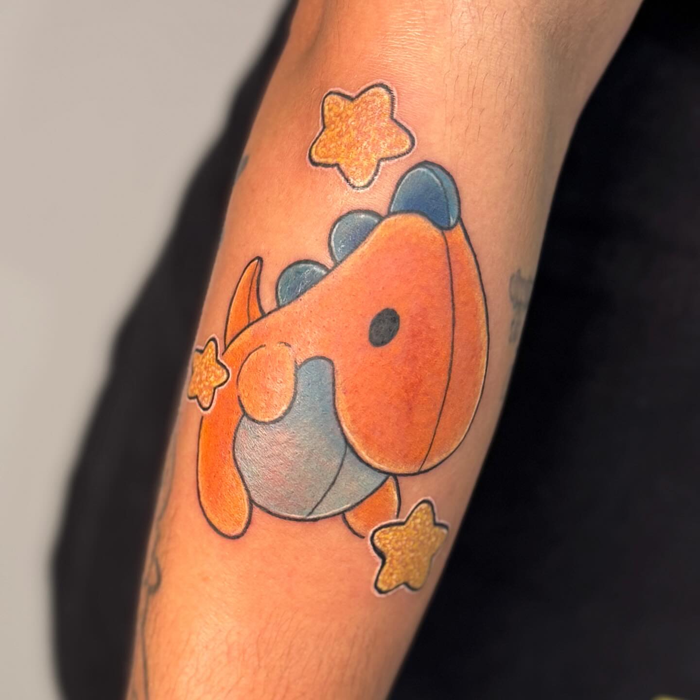 Fish new school tattoo on the forearm by Ashley Rose - Minnesota Tattoo Artist