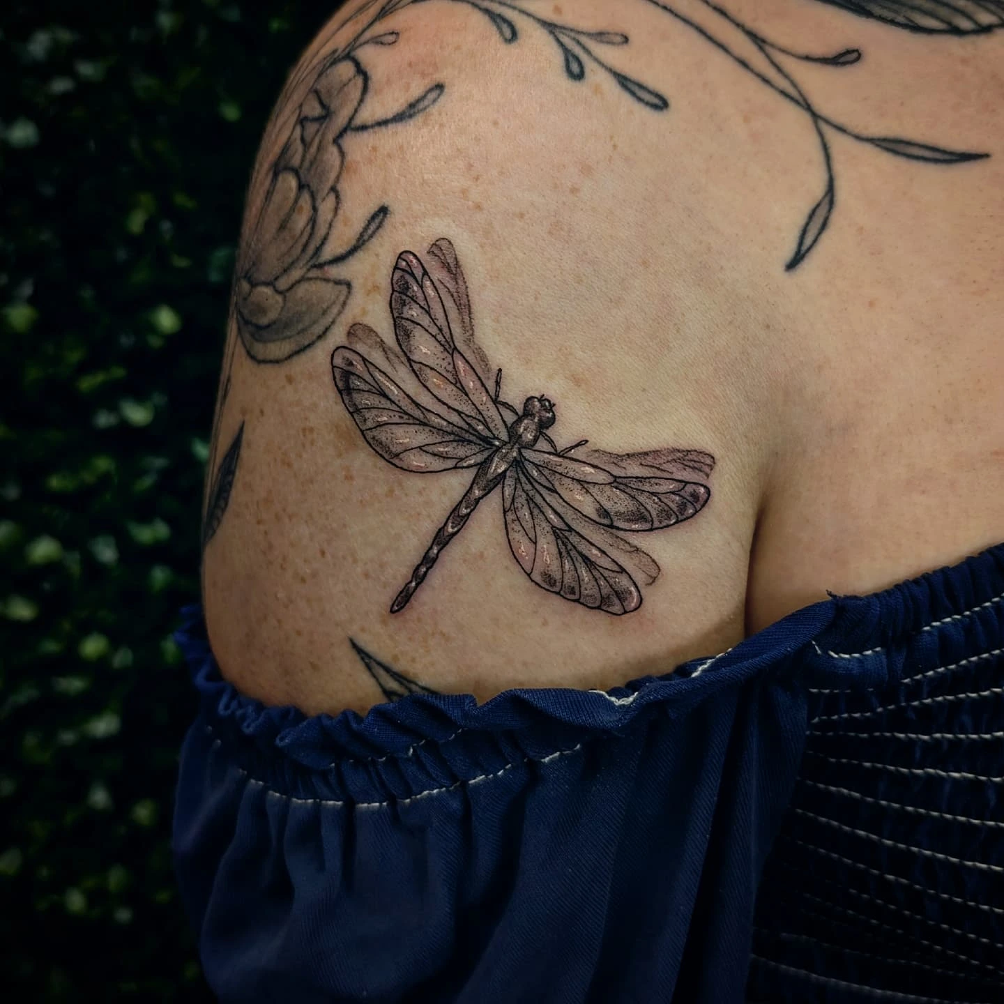 Dragonfly realism tattoo on the shoulder by Marlayna Connelly
