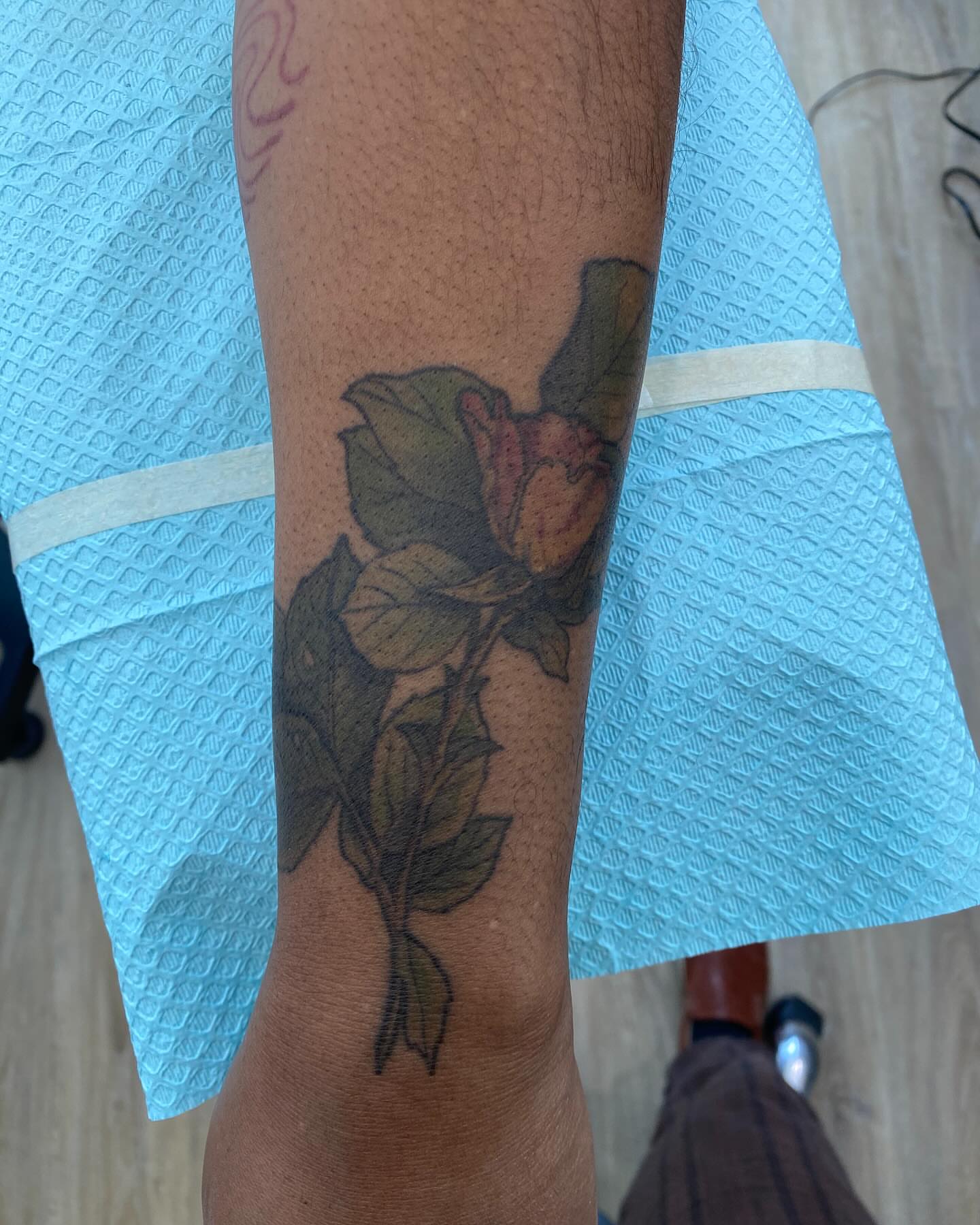 Flower realism tattoo on the forearm by Rusty Indigo