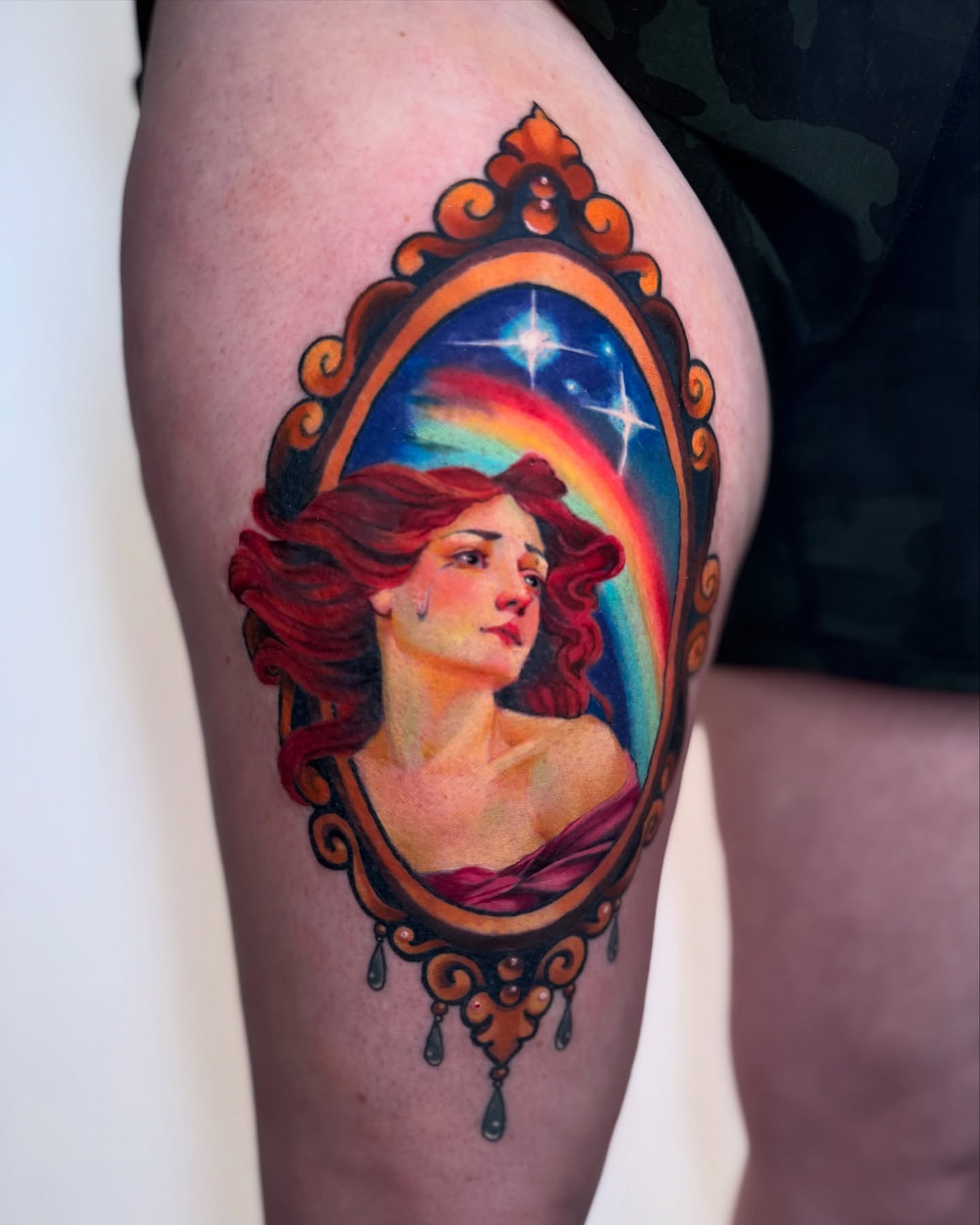 Portrait of a woman illustrative tattoo on the thigh by Hannah Mckee