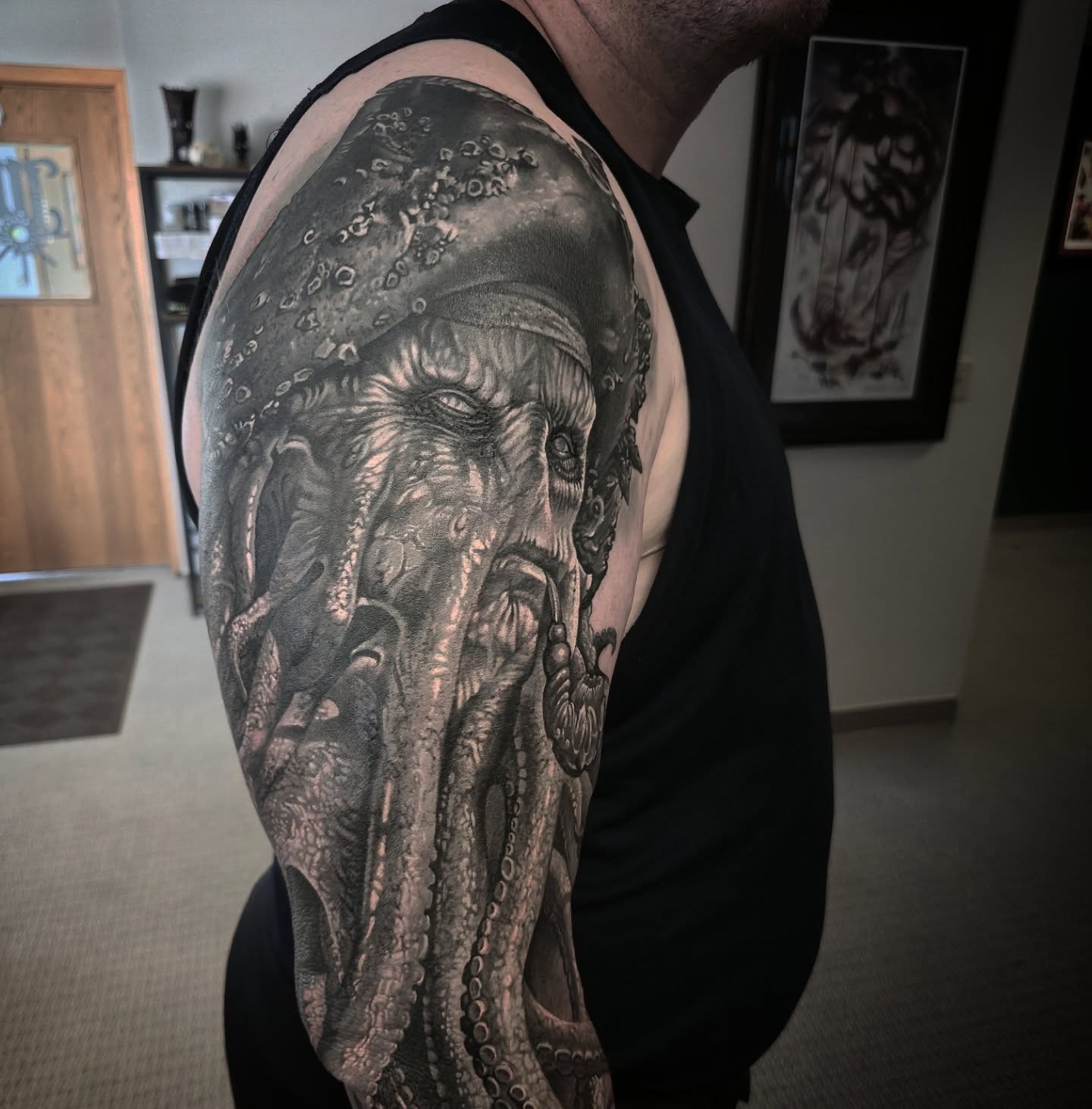 Octopus realism tattoo on the shoulder by Alexander L. Wolff, Rapid City, South Dakota