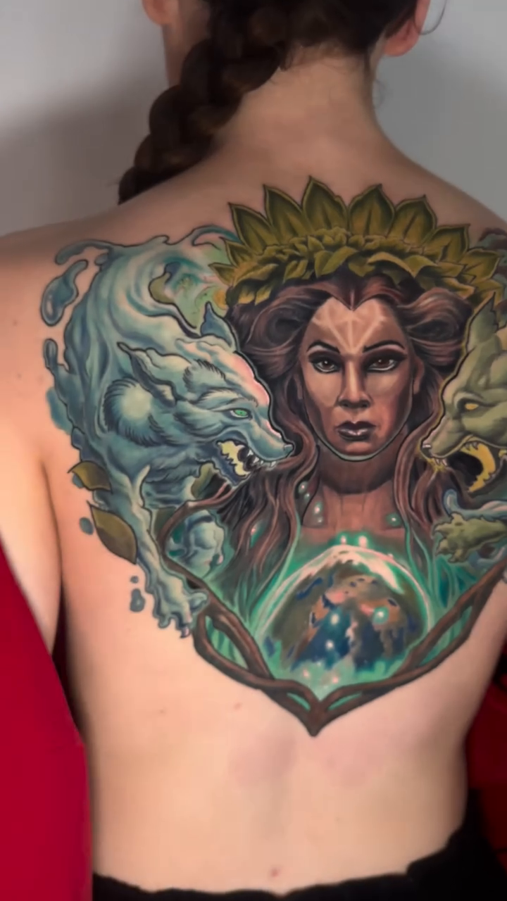 Goddess with lions and celestial elements realism tattoo by Zoe "Z" Fisk