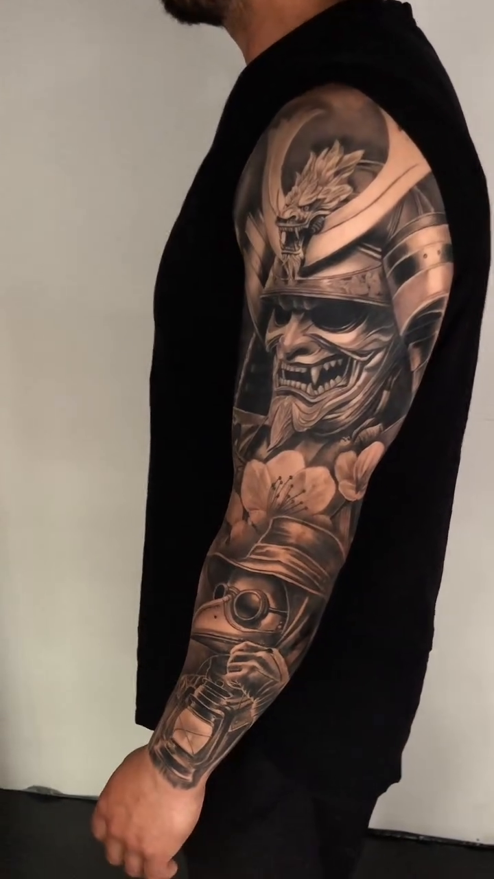 Samurai helmet and mechanical elements realism tattoo by David "Mager" Torres