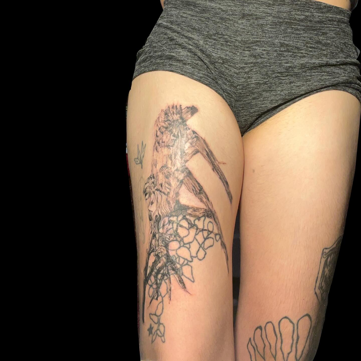 Bird black and grey tattoo on the thigh by ren