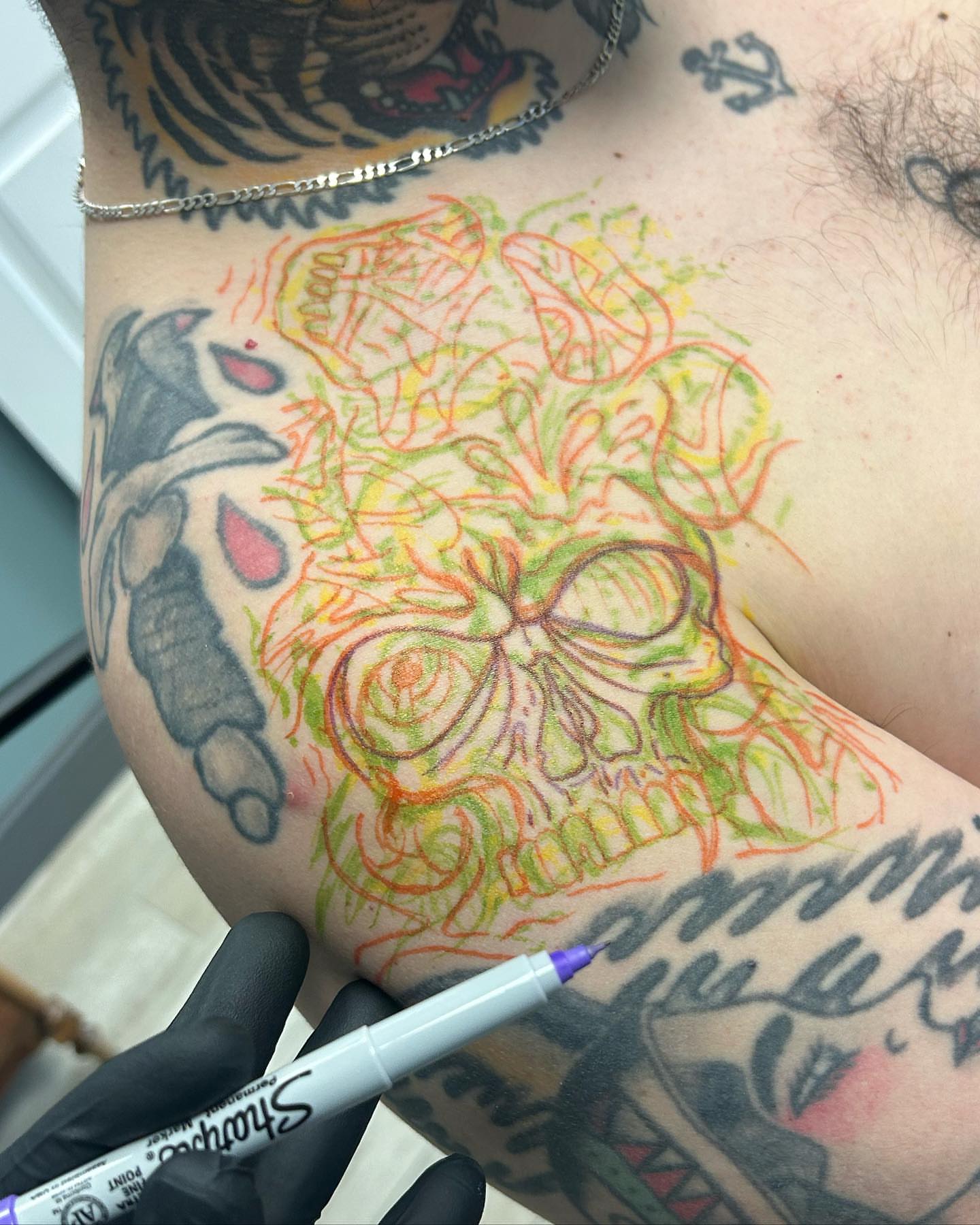 Skull new school tattoo on the chest by Alex Lang