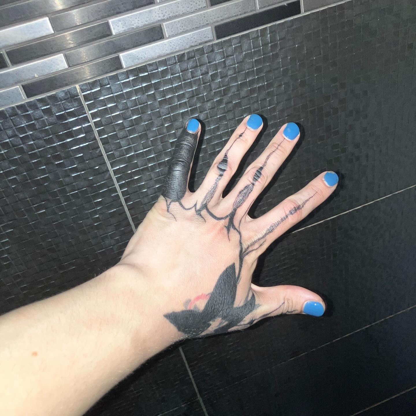 Root system black and grey tattoo on the hand by @godsfirmgrip