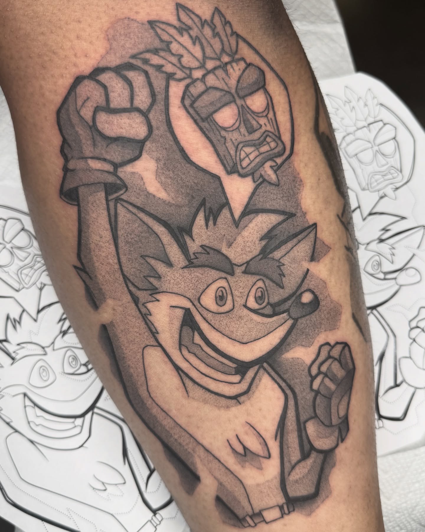 Koala and mask black and grey tattoo on the forearm by Donnie Moore