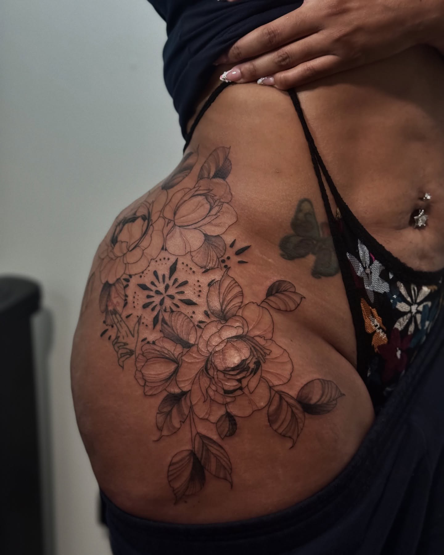 Floral bouquet black and grey tattoo on the shoulder by Kbtattz