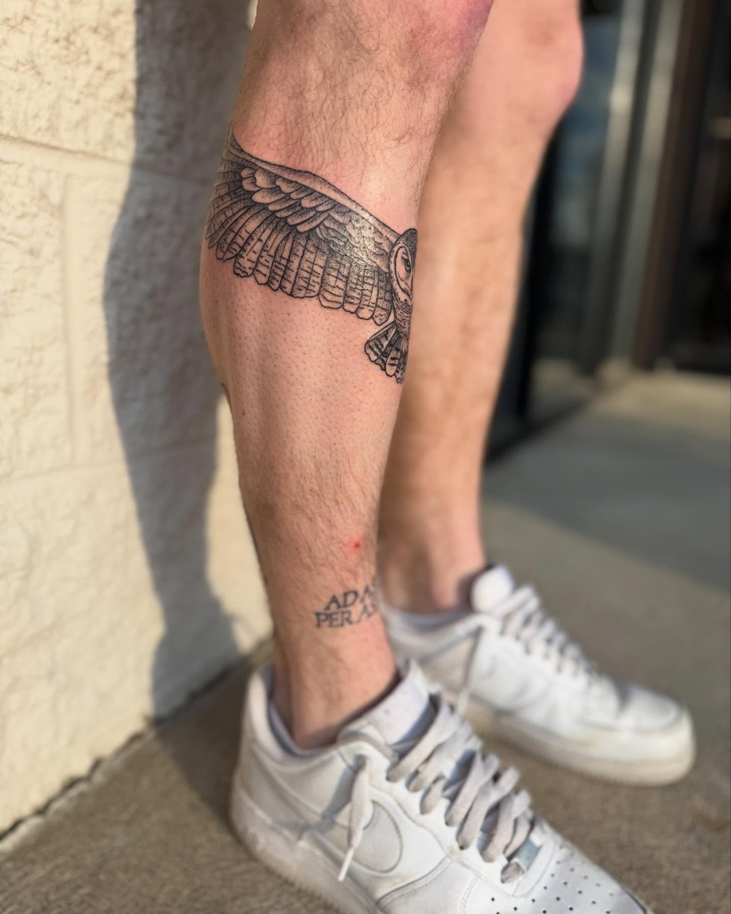 Owl black and grey tattoo on the leg by Marissa Losier