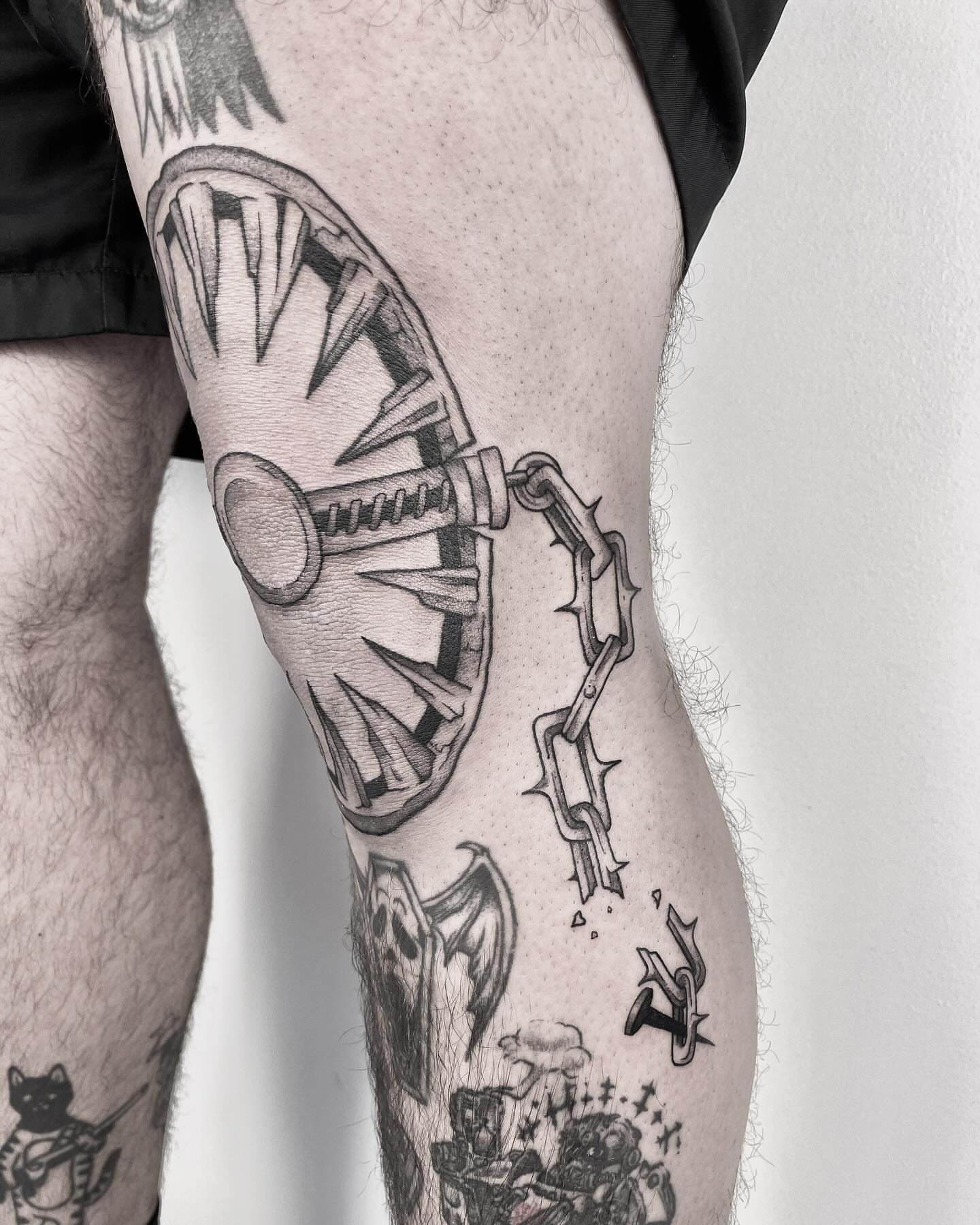 Key and chain black and grey tattoo on the leg by ππππππ