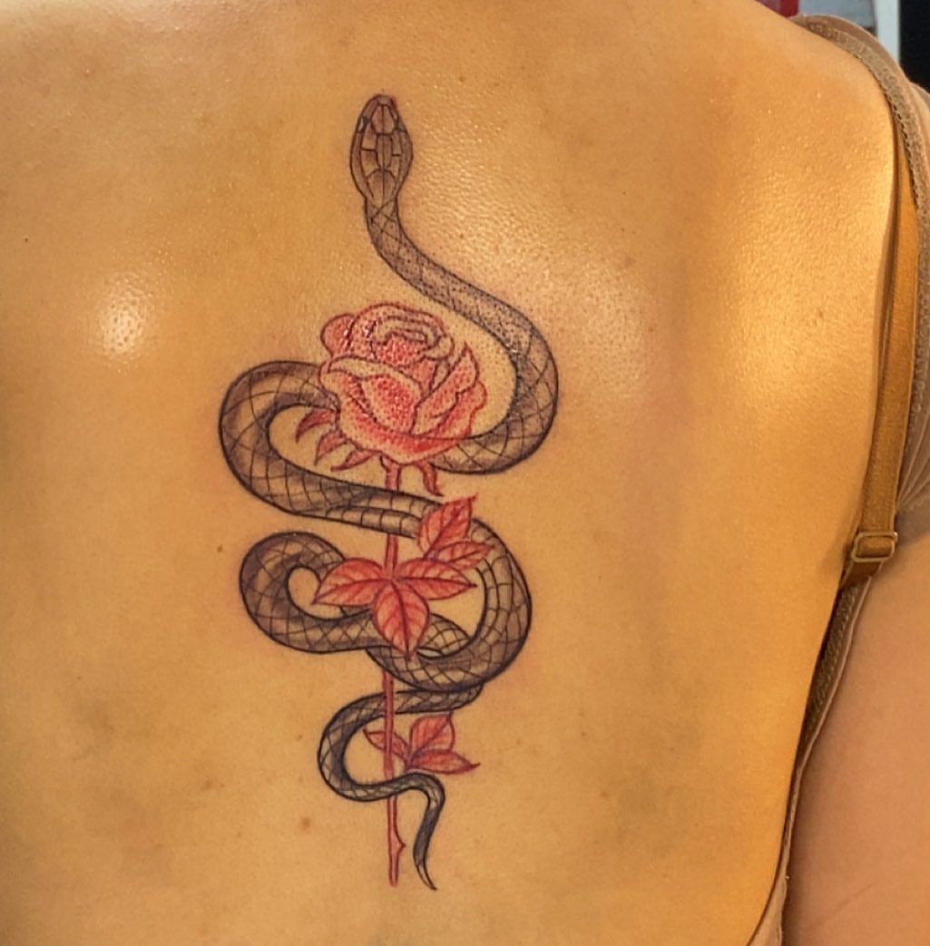 Snake and rose geometric tattoo on the back by Tattsruru