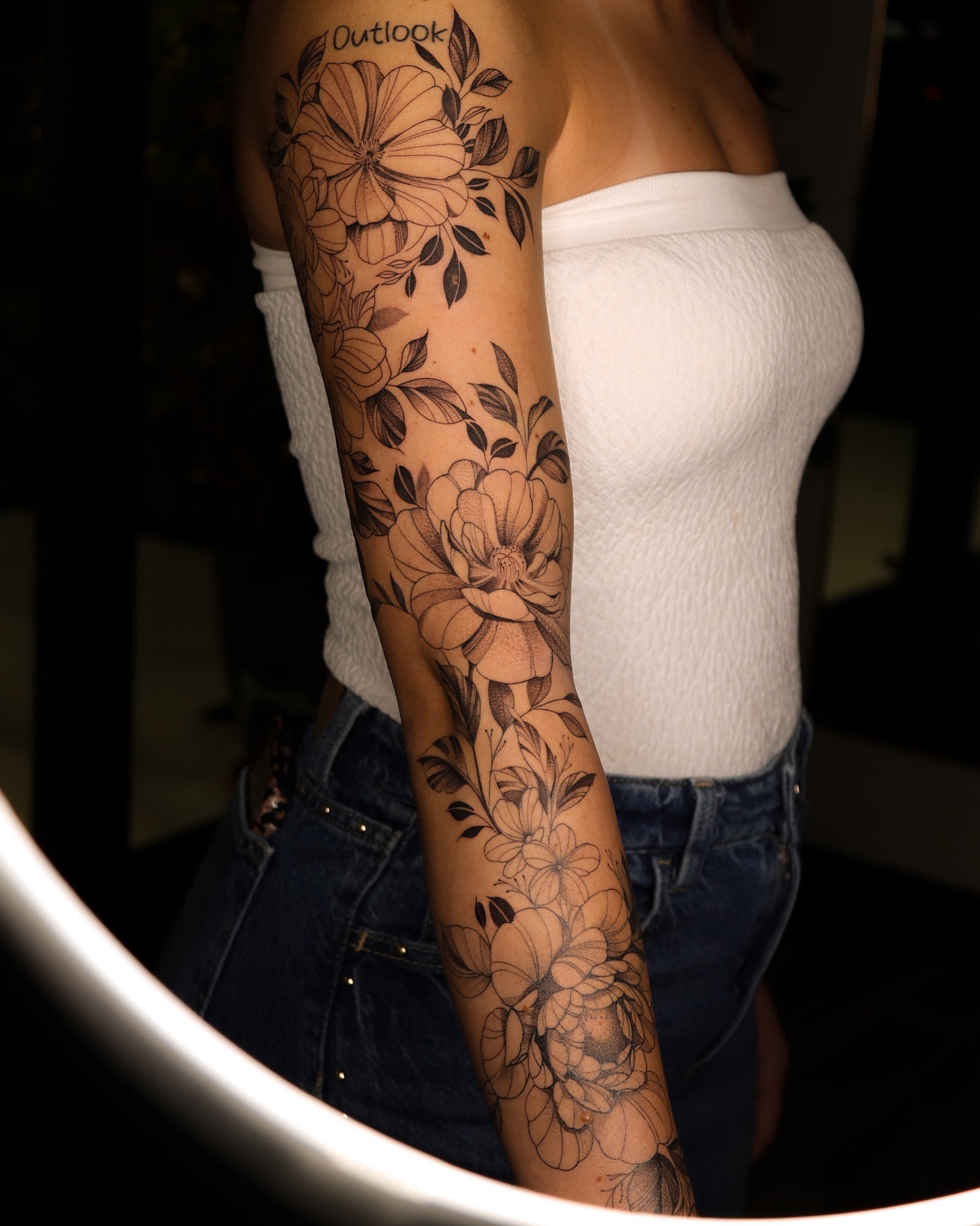 Floral bouquet black and grey tattoo on the forearm by Beans
