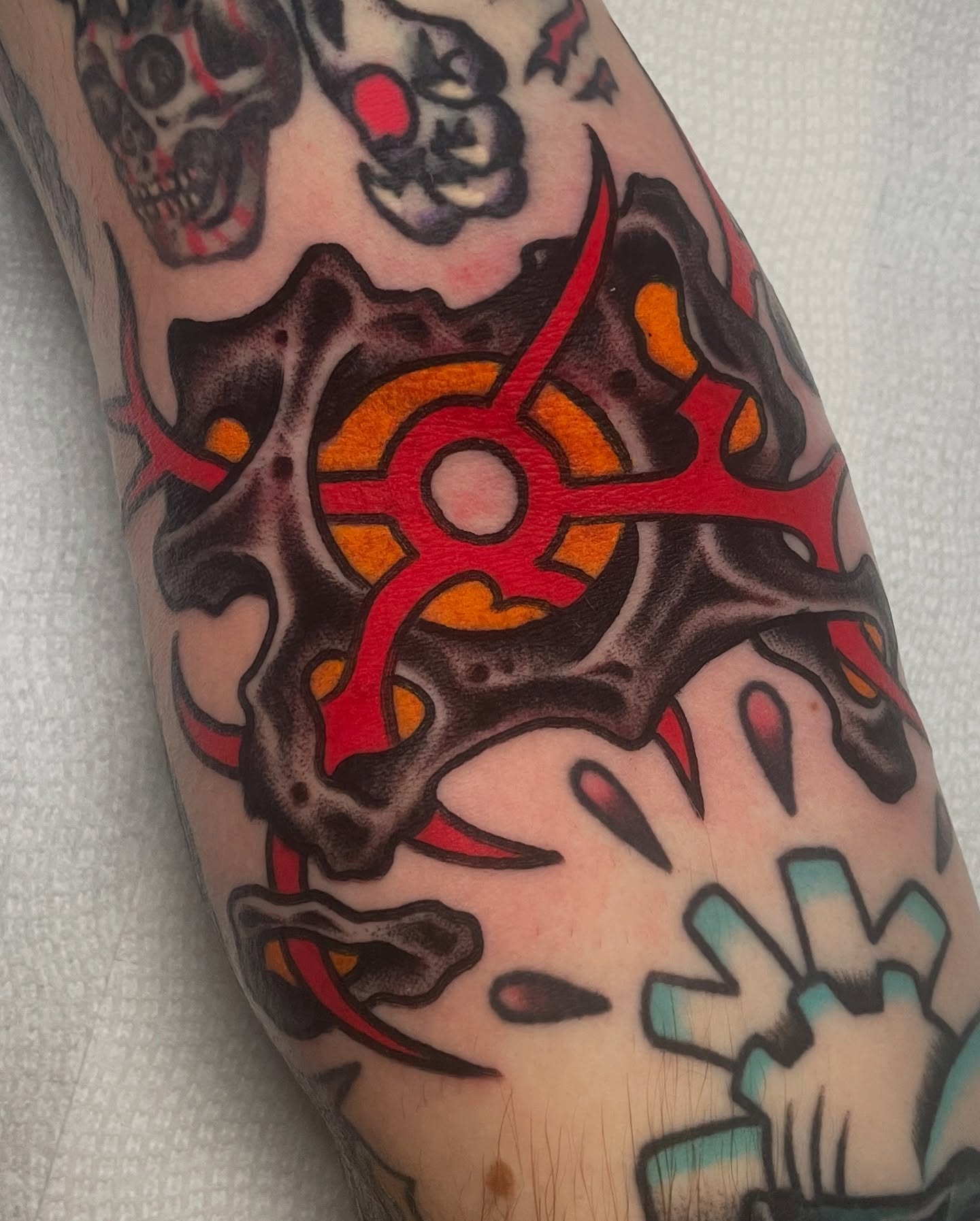 Geometric gear geometric tattoo on the forearm by David Armacost, Cincinnati, Ohio