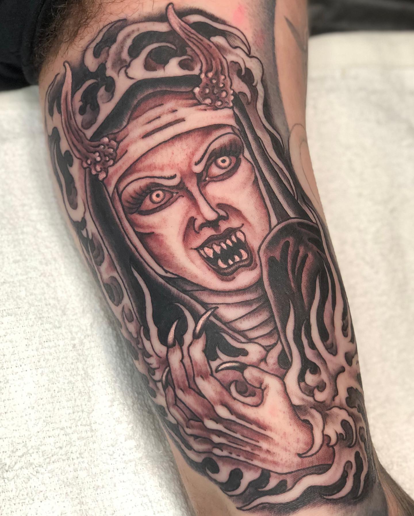 Ghoul realism tattoo on the forearm by Matt Klass