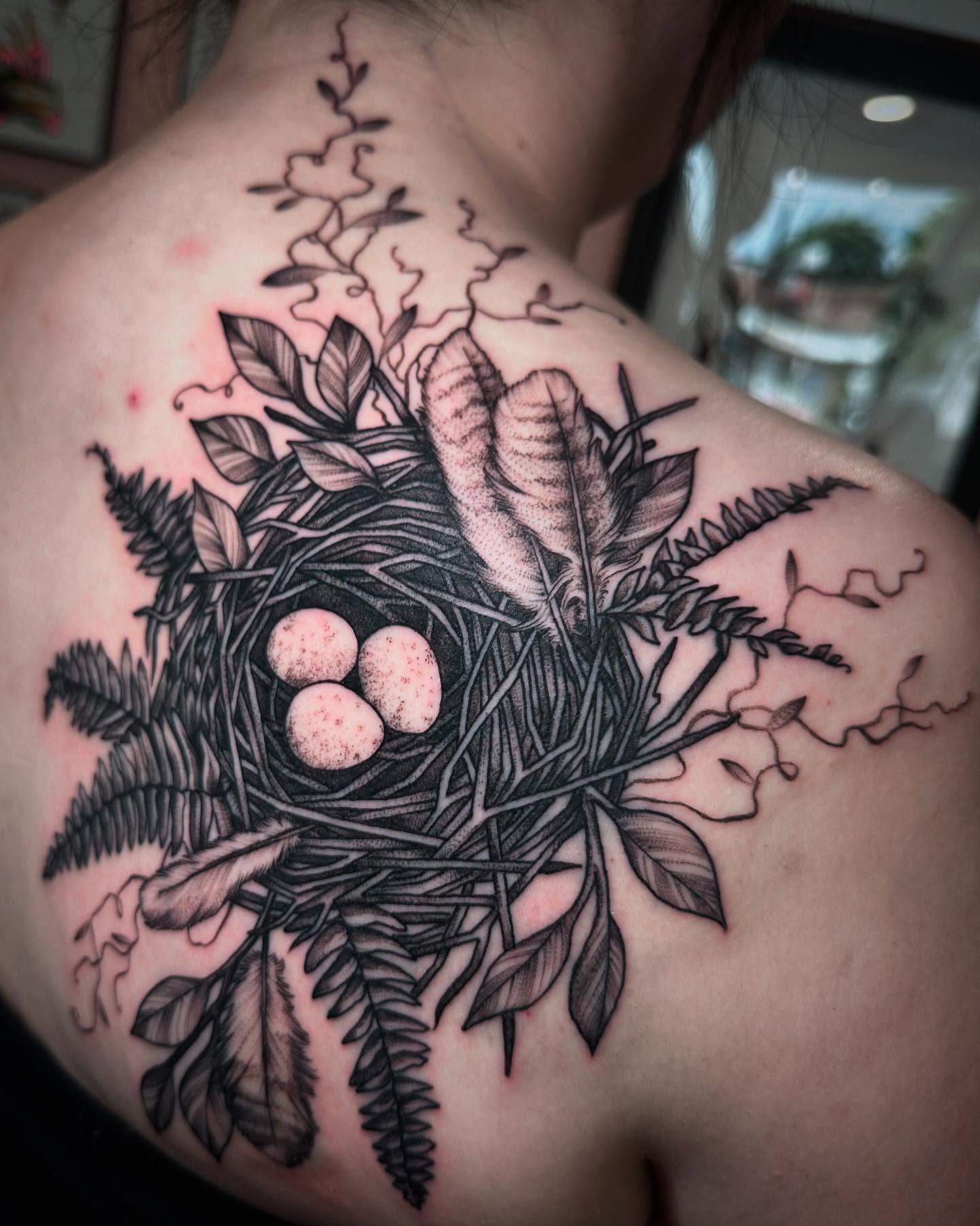 Nest with eggs dotwork tattoo on the shoulder by Dani Johnson