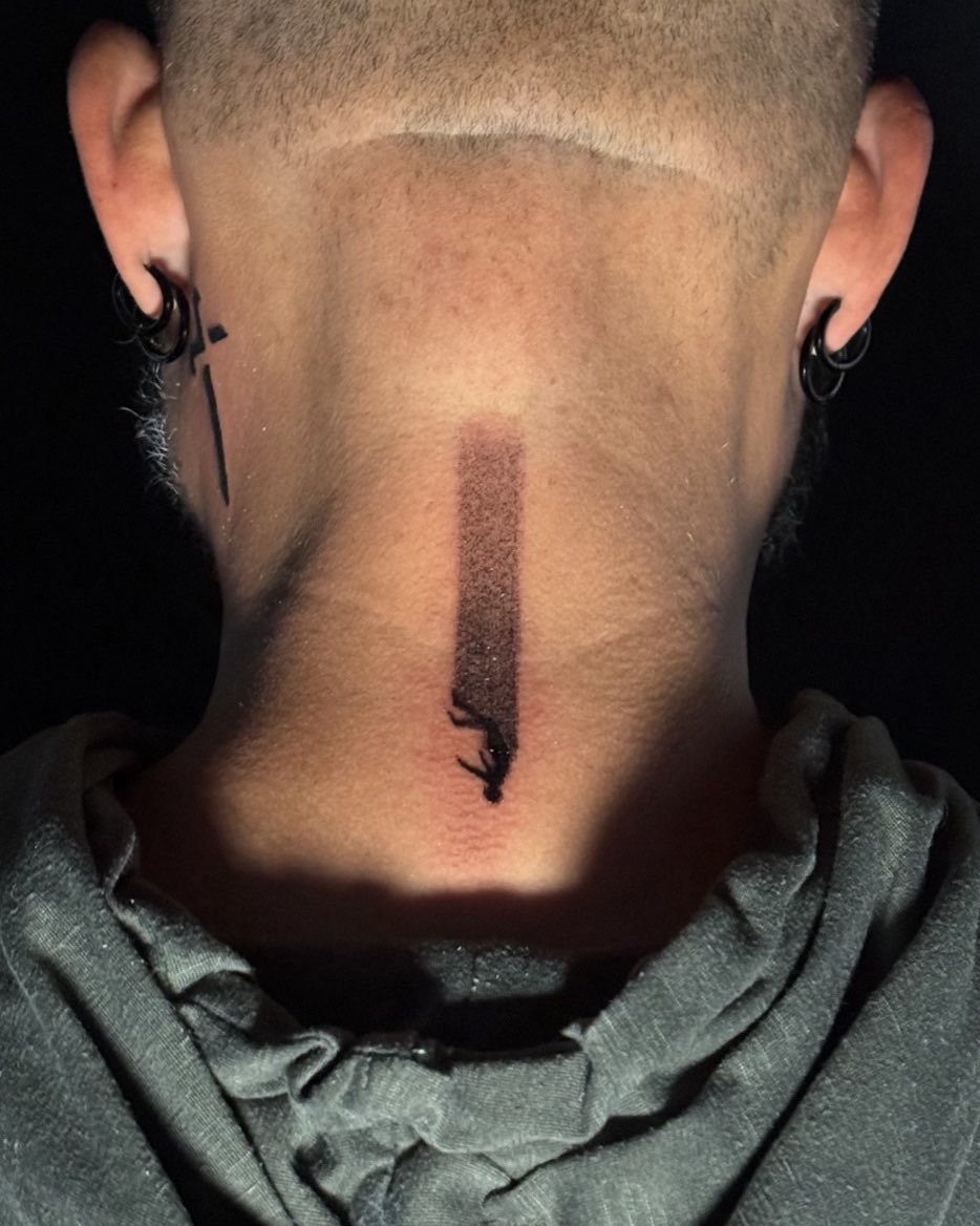 Arrow black and grey tattoo on the neck by David