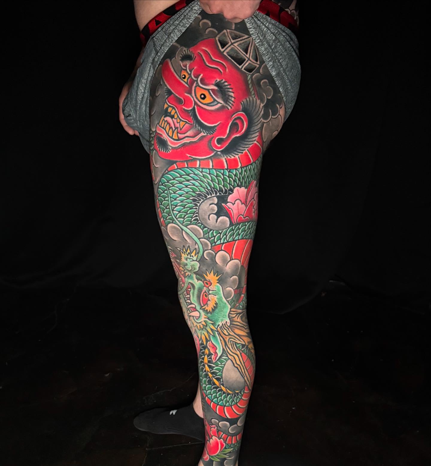 Dragon and demon japanese irezumi tattoo on the leg by Mark Thompson, Dallas, Texas