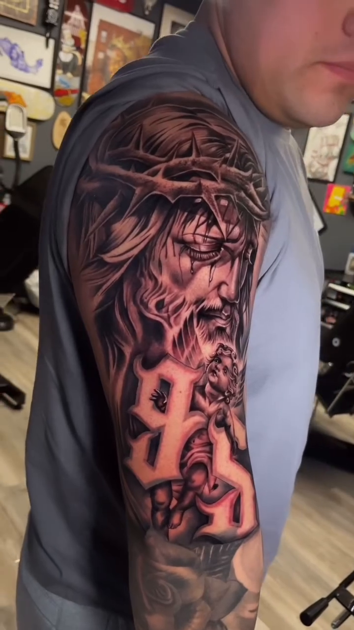 Tattoo by @stheve_blessed — realism, black_and_grey