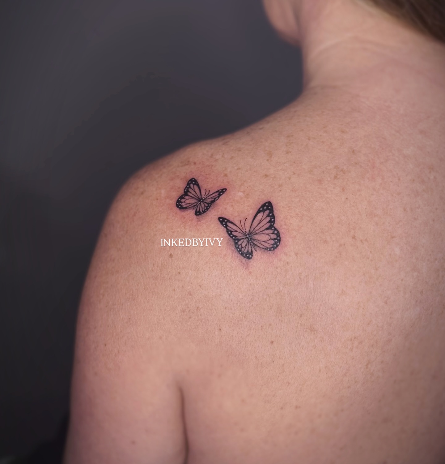 Butterflies black and grey tattoo on the shoulder by IVY