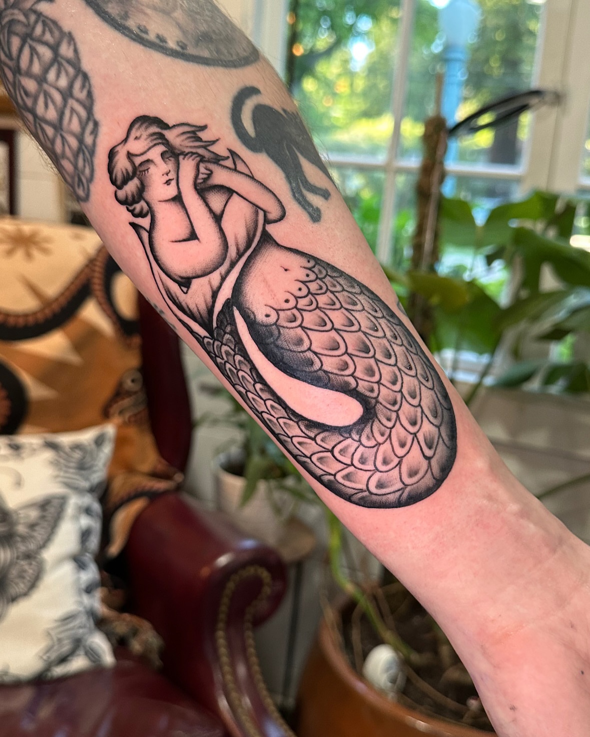 Mermaid American traditional tattoo on the forearm by Max Peterson