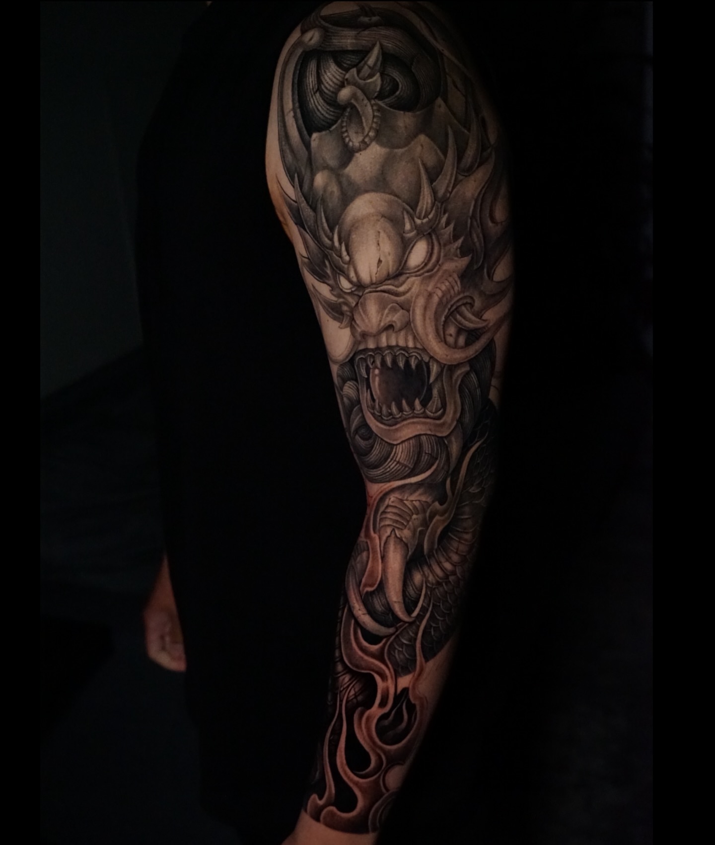 Demon dark realism tattoo on the forearm by Anh Nguyen