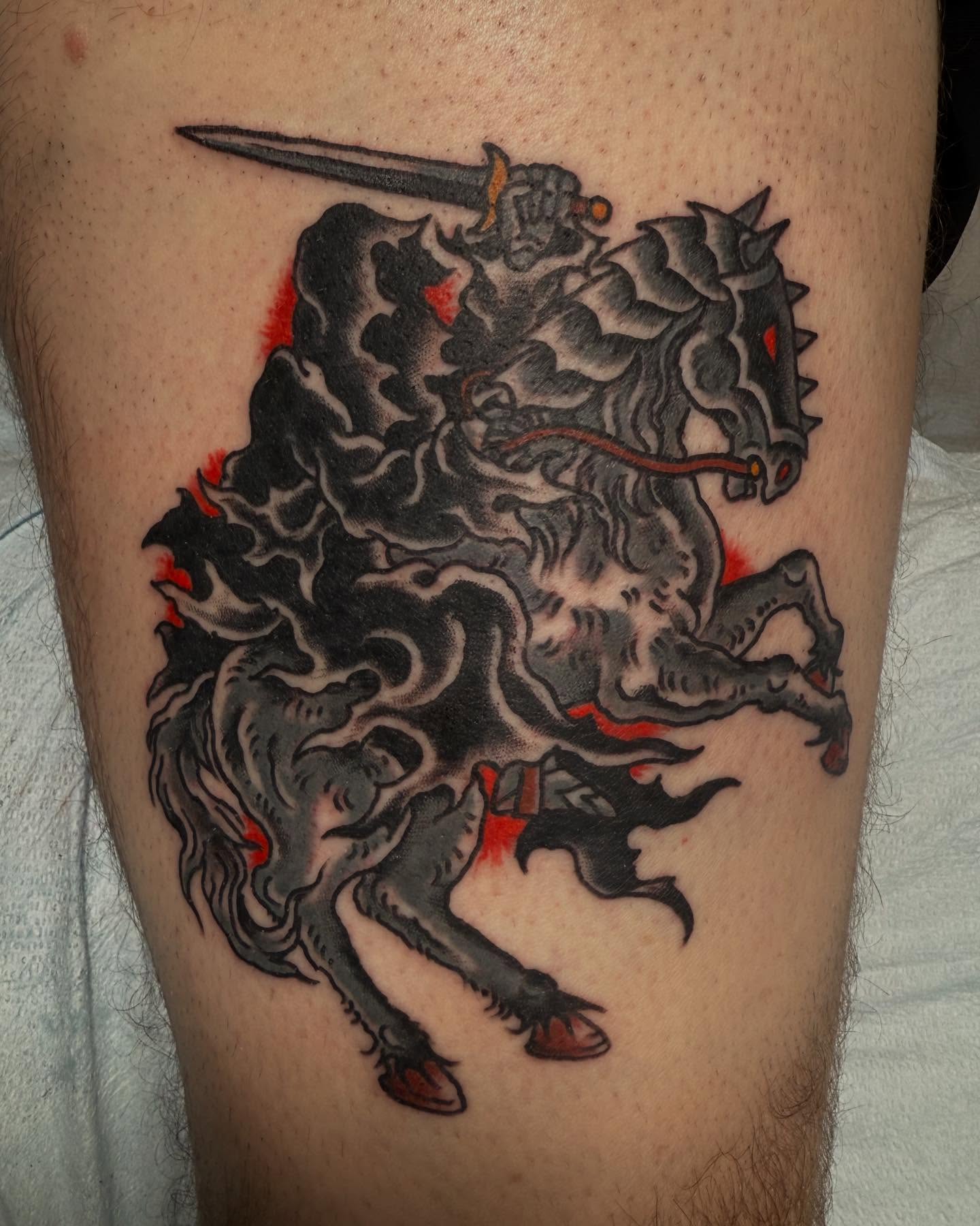 Warrior on horseback American traditional tattoo on the thigh by Jesse Swanson, Santa Rosa, California